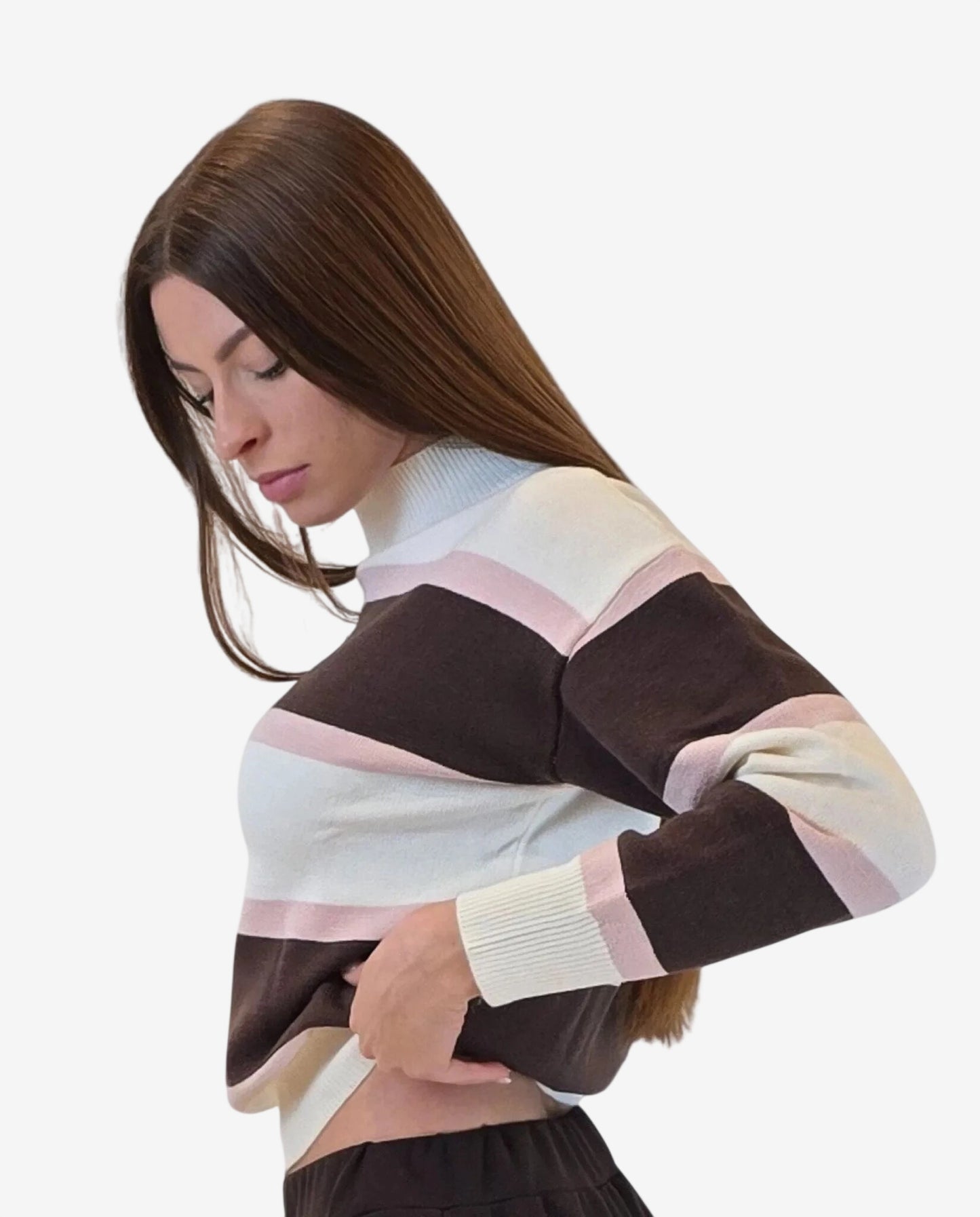 A woman wears a long-sleeved pullover featuring horizontal stripes in cream, mocha, and pale pink.