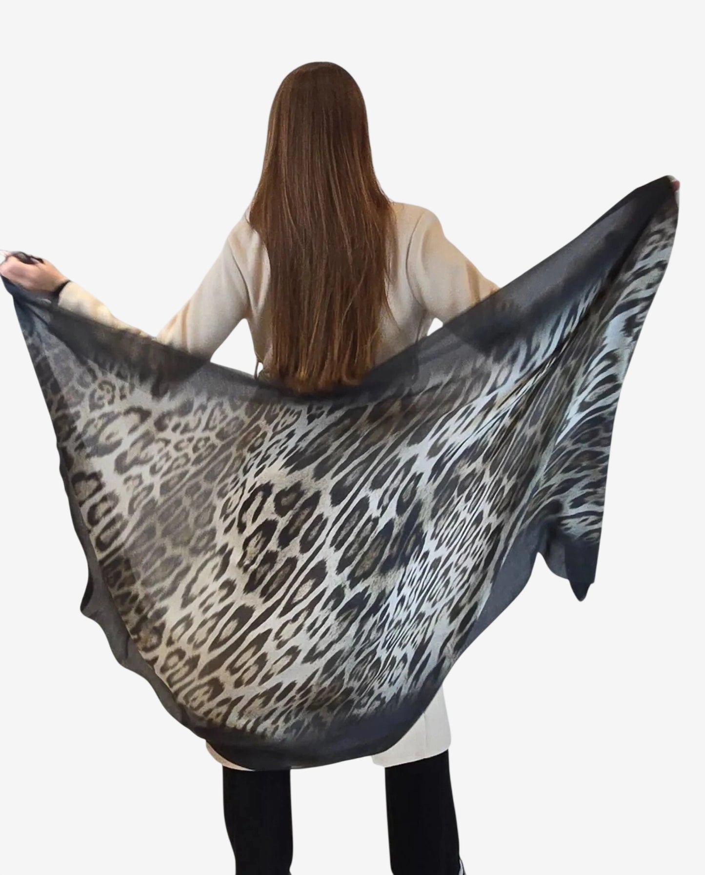 Stola da donna in modal e lana con elegante motivo animalier sfumato.