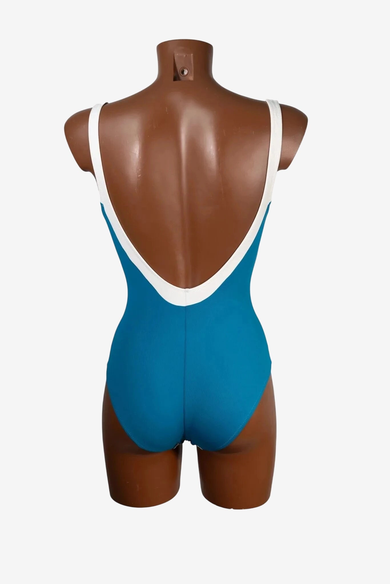 Costume intero Unimar blu con scollo profondo sulla schiena e bordi bianchi a contrasto.