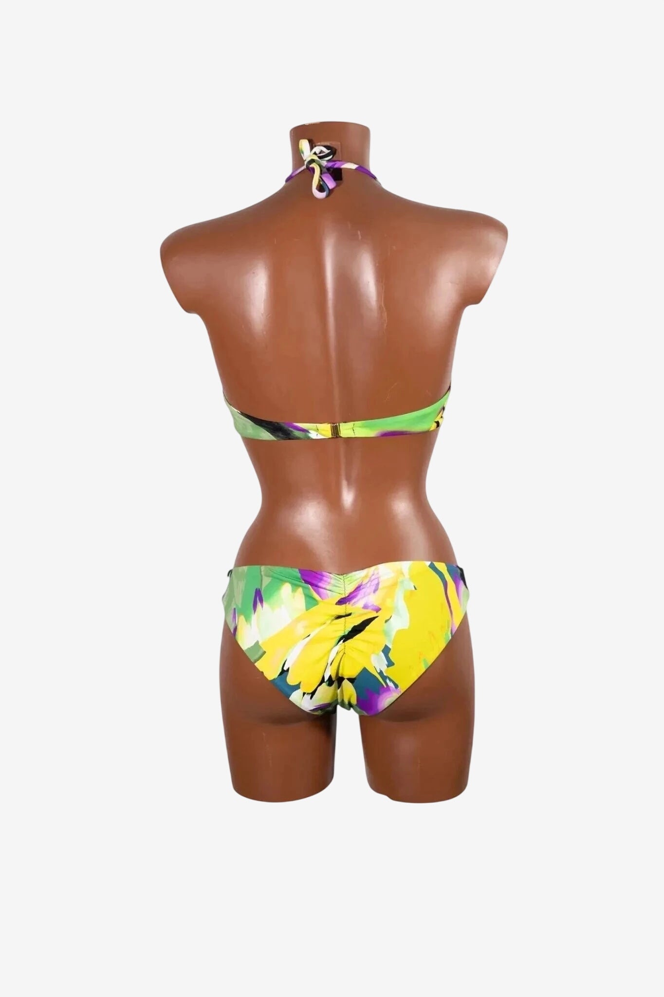 Bikini bralette Marette con fantasia floreale nei toni del lime, giallo e viola.