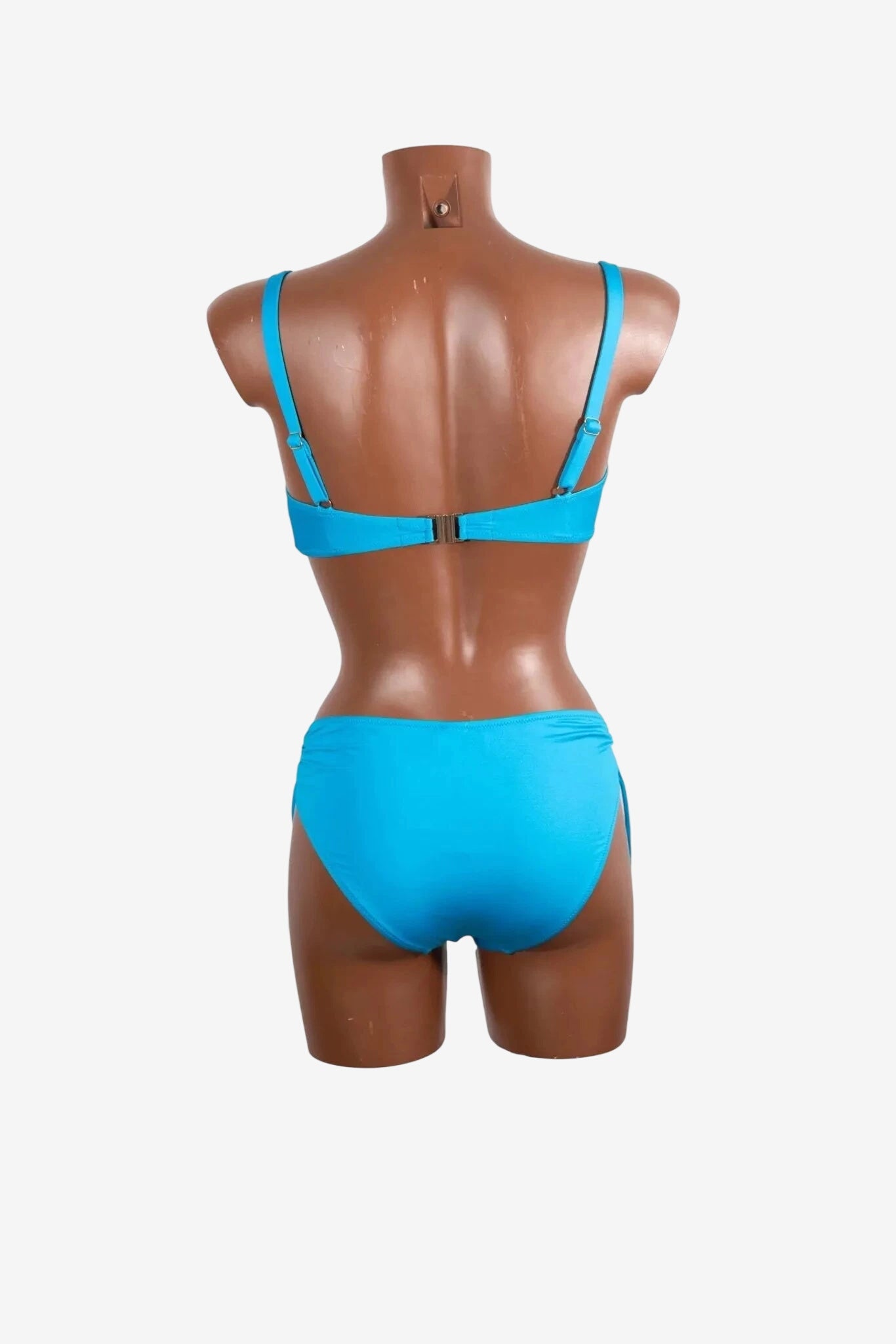 A bright blue bikini set with an underwire top and classic bottoms shown from the back.