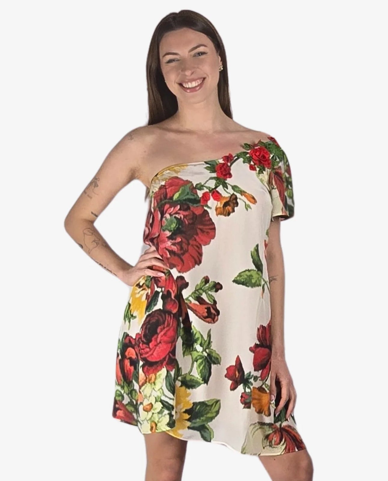 Abito monospalla corto in viscosa bianca con stampa floreale multicolor.