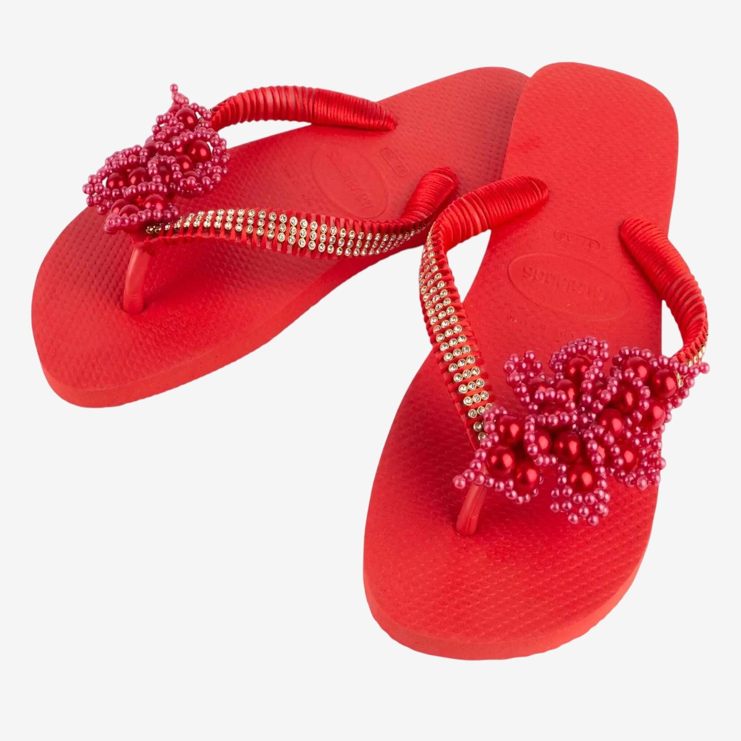 Infradito Havaianas rosse decorate a mano con perle e strass.