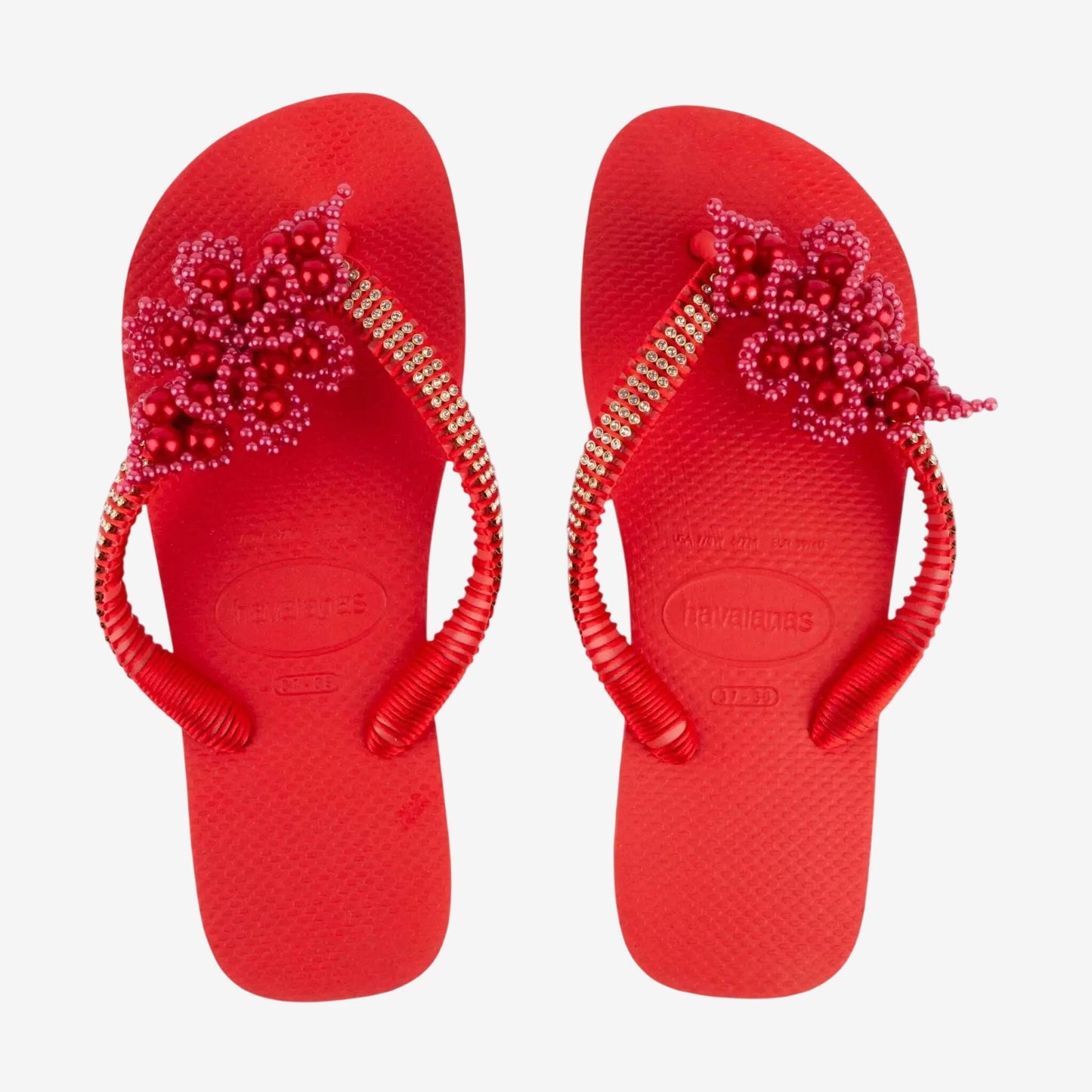 Infradito Havaianas rosse decorate a mano con perline e strass.