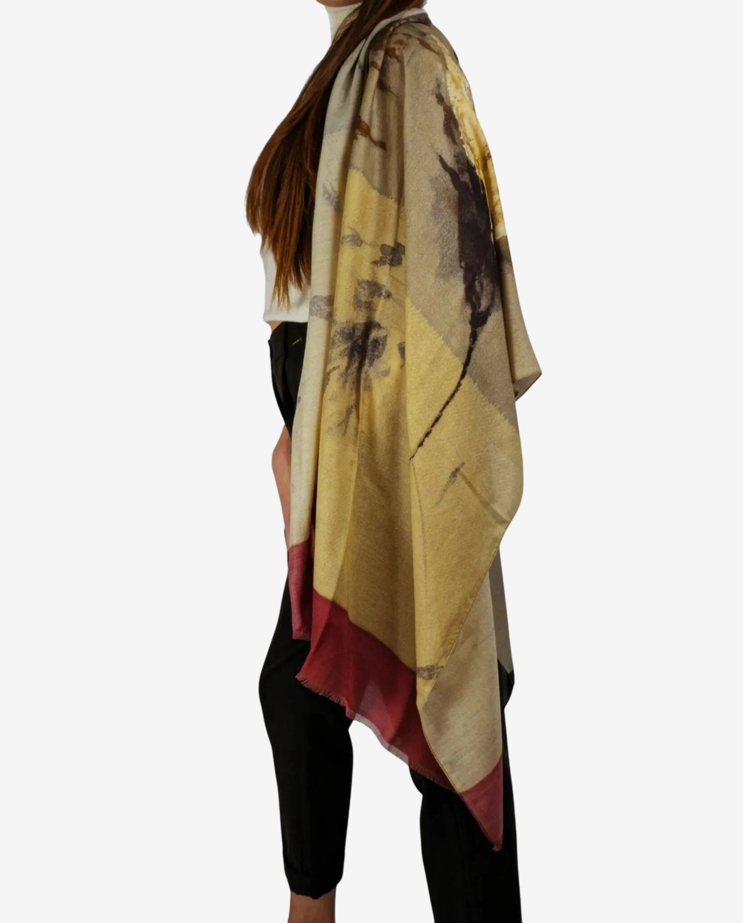 Stola da donna in modal e lana con un elegante motivo floreale astratto nei toni del beige.