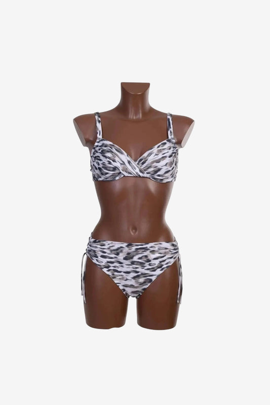 Bikini Roidal con ferretto e coppa C caratterizzato da una stampa animalier su fondo bianco.