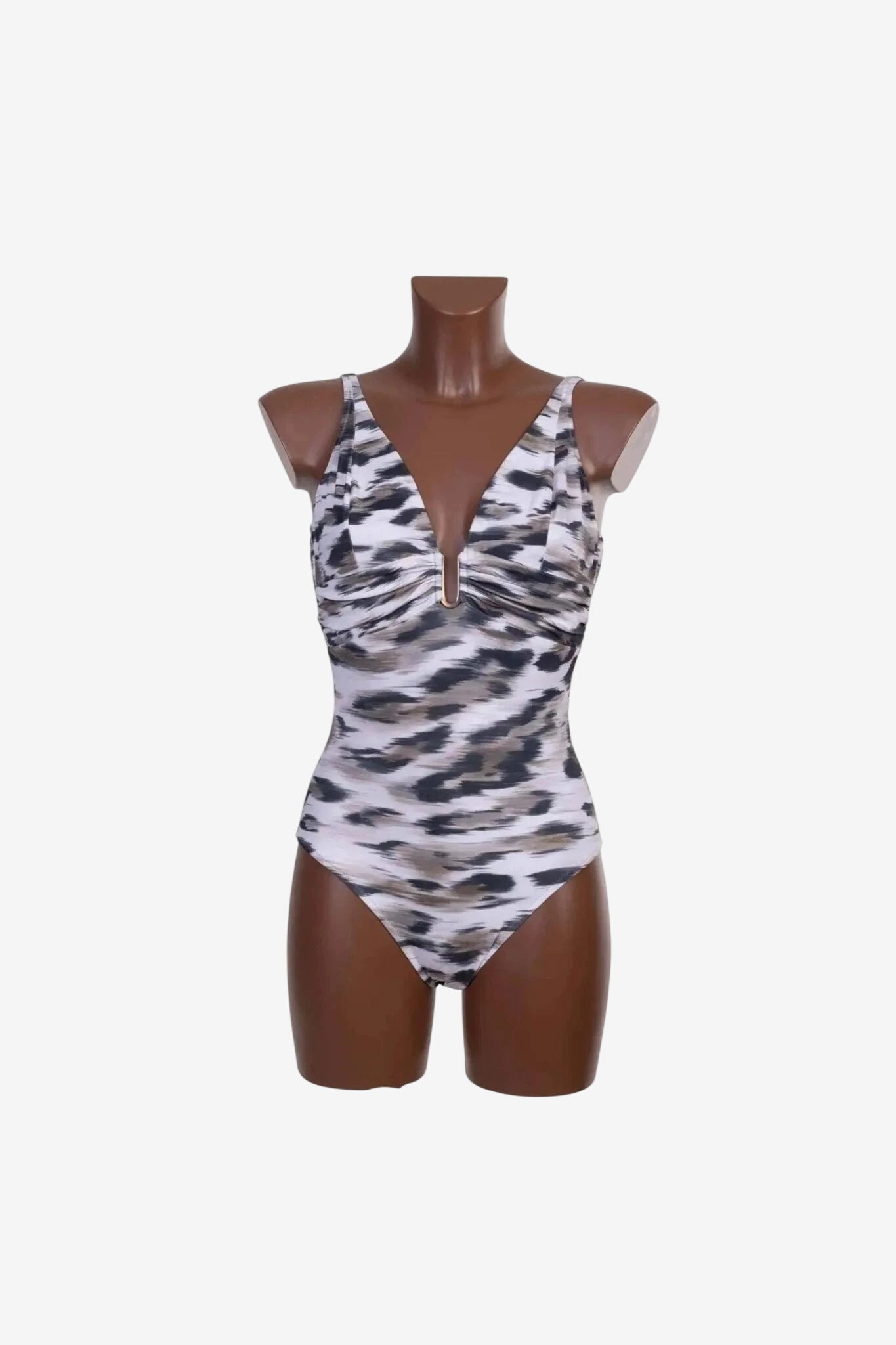 A one-piece swimsuit with a v-neckline and a metallic center detail in a grey animal print.