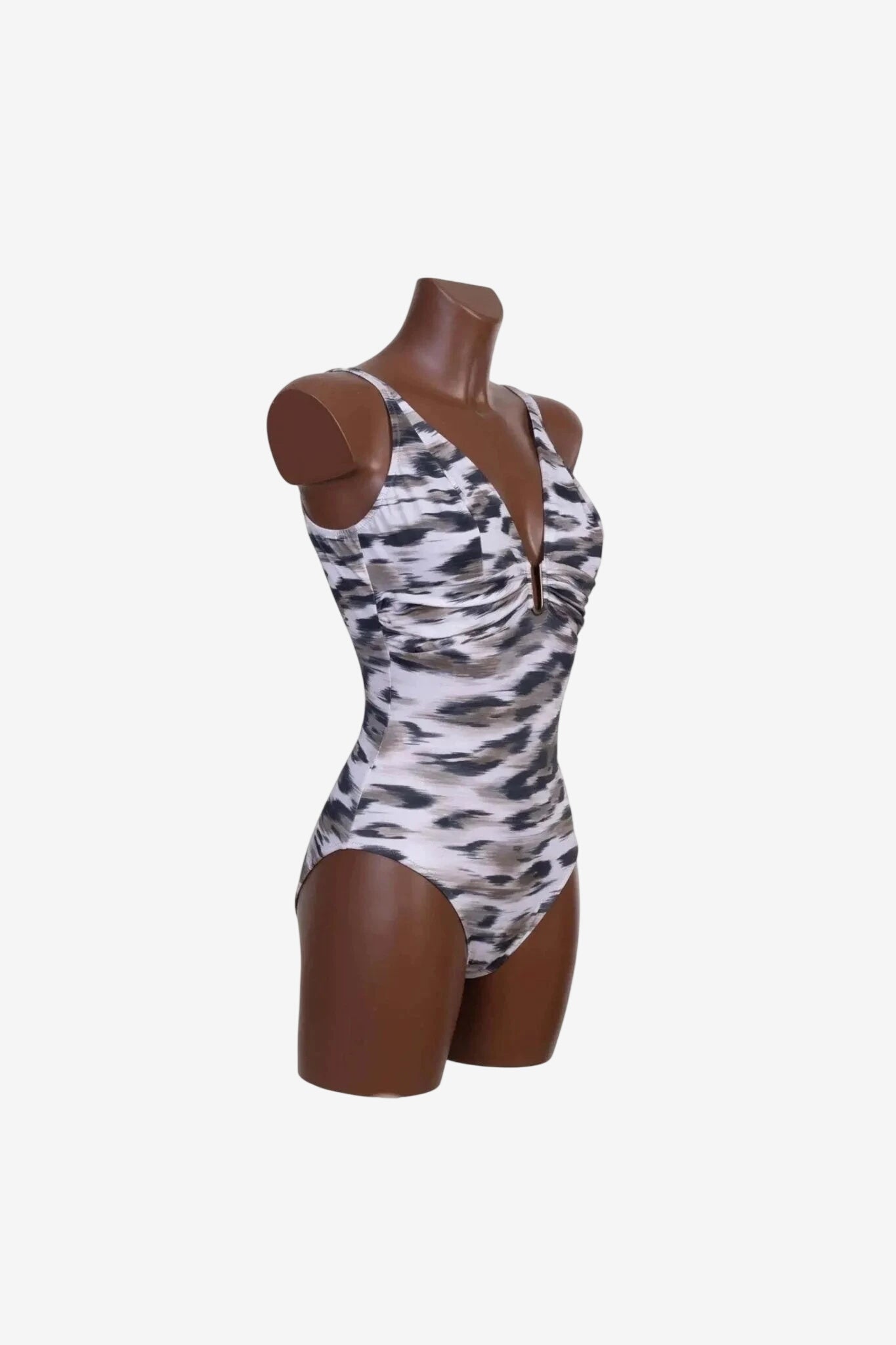 A one-piece swimsuit with a V-neckline and a grey and white abstract animal print pattern.