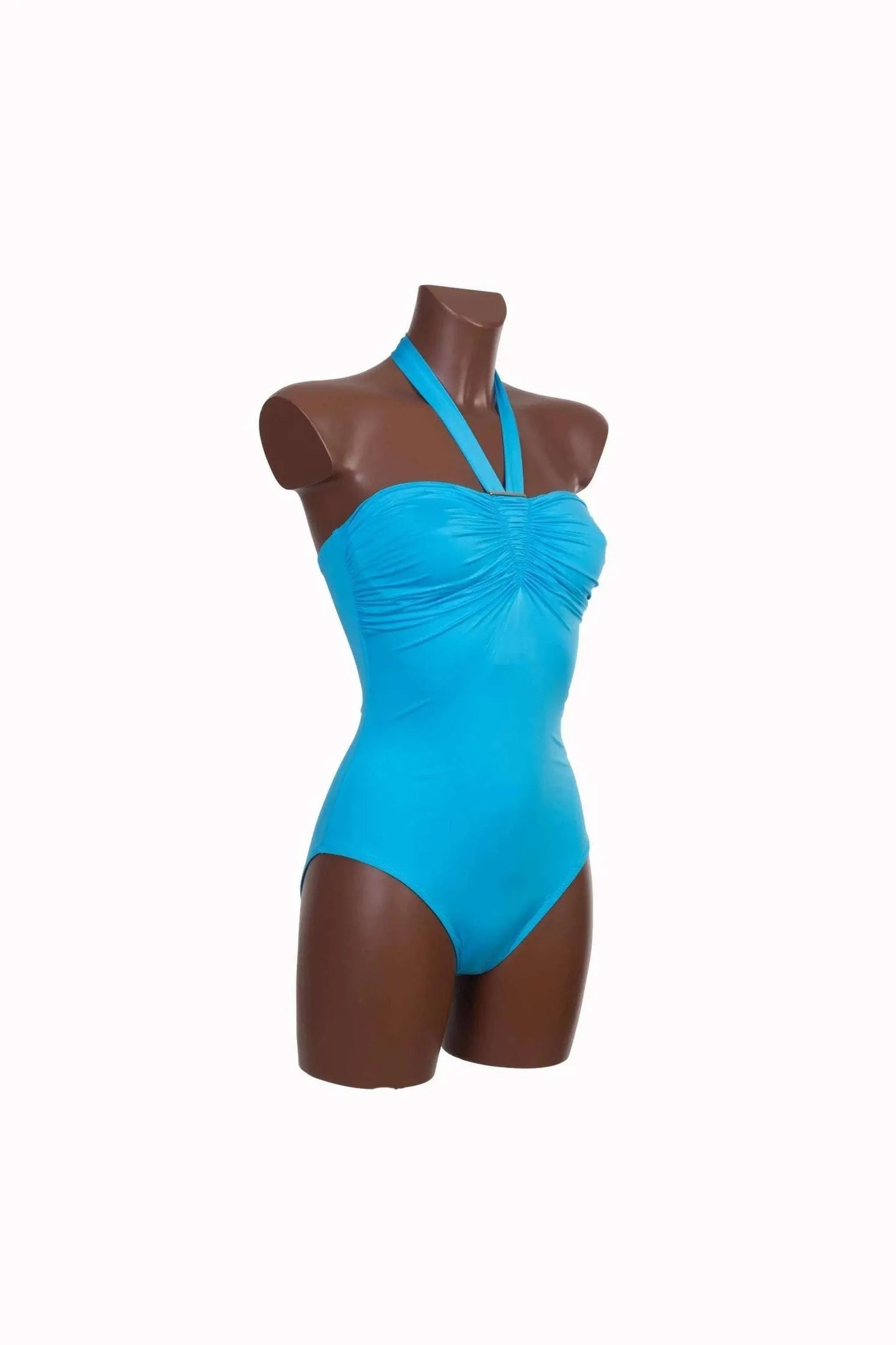 A bright blue one-piece swimsuit with a ruched bodice and halter neck on a mannequin.