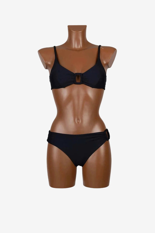A black bikini bralette set featuring a center ring detail on the top and side ring on the bottoms.