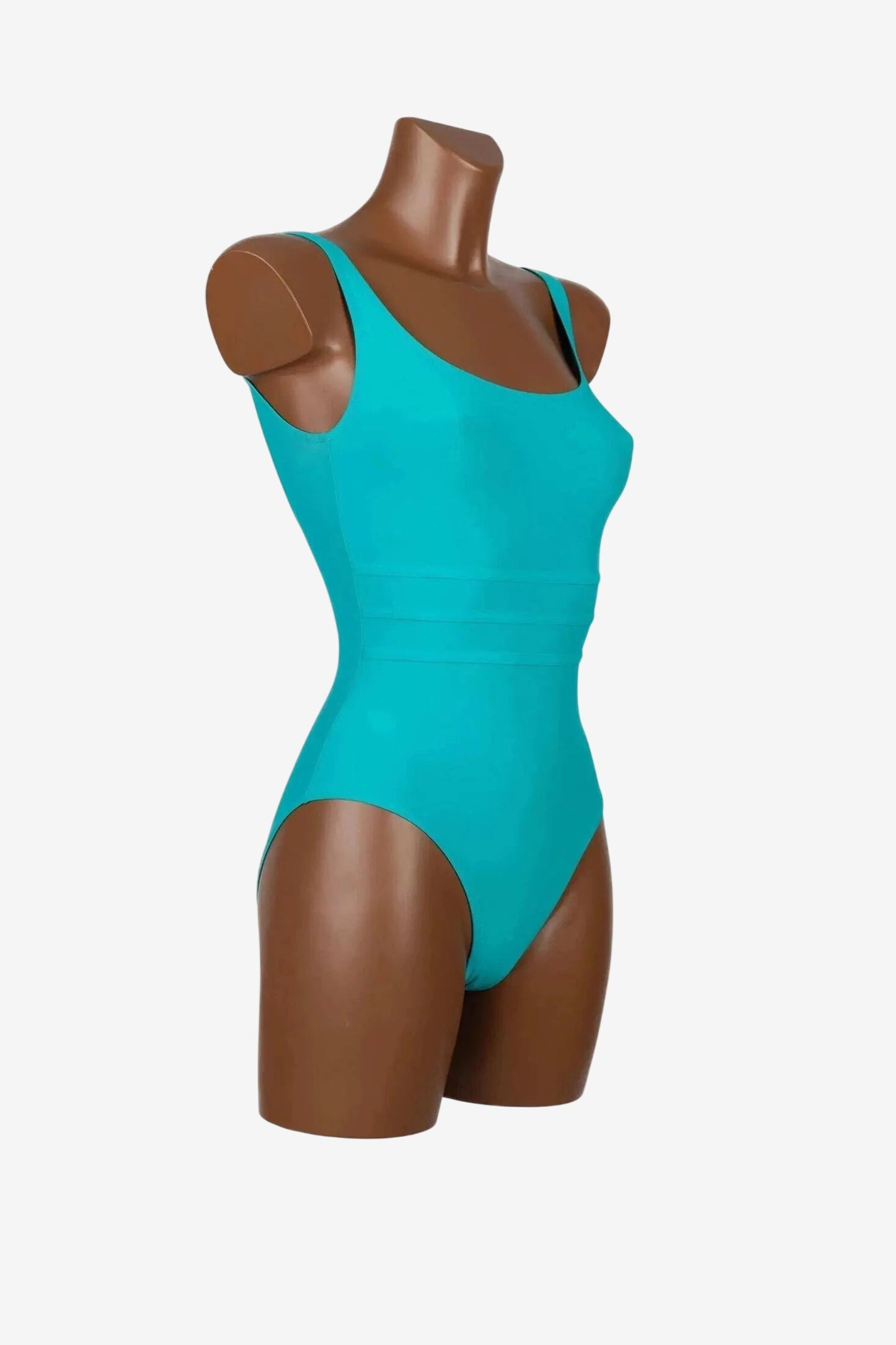 Costume intero olimpionico Roidal di colore verde acqua su manichino.