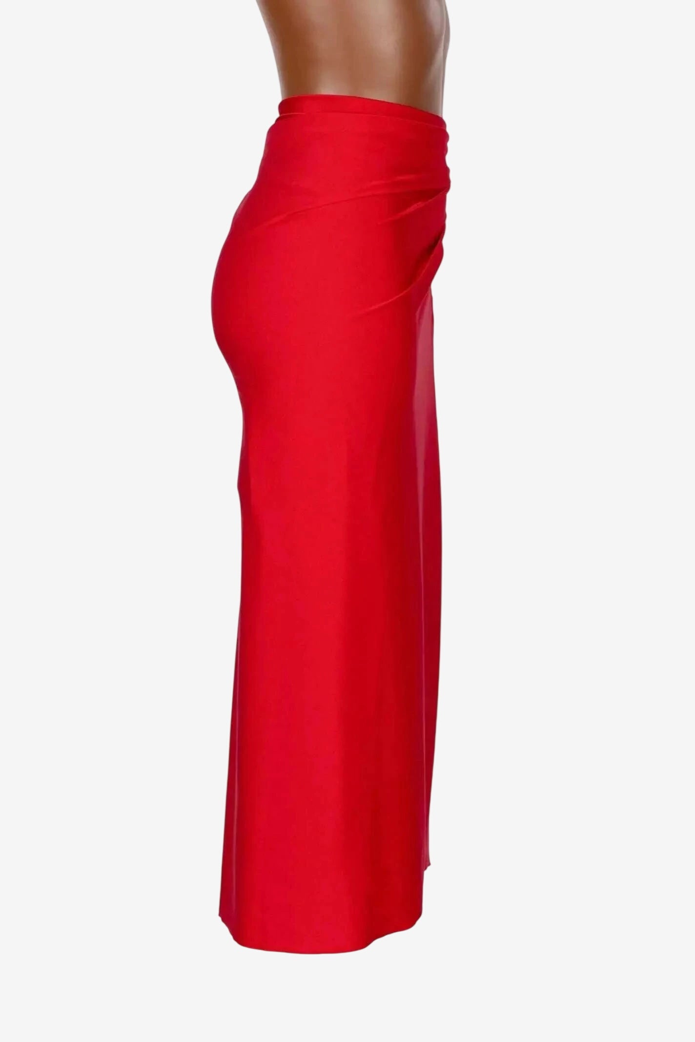A midi-length red pareo skirt made from shiny lycra fabric.