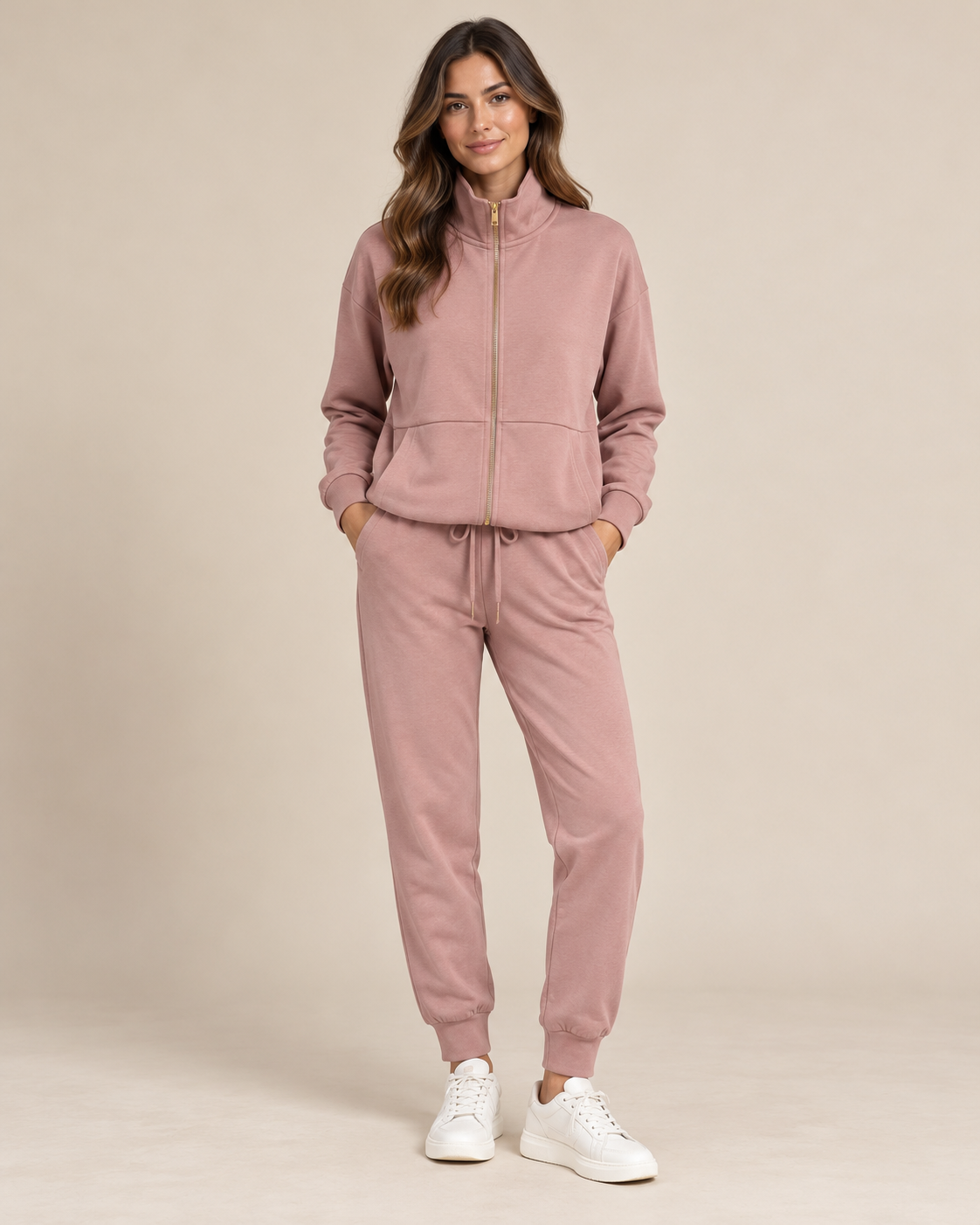 Tuta donna rosa cipria con zip e pantaloni jogger Selmark