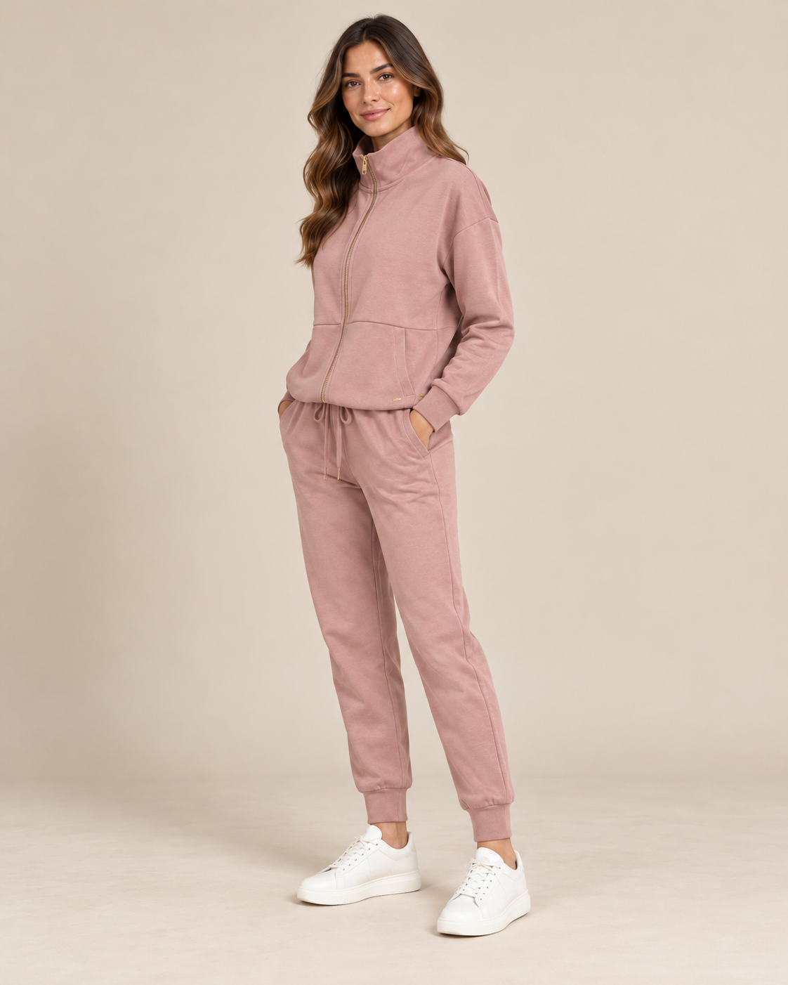 Tuta donna rosa cipria con zip e pantaloni jogger Selmark