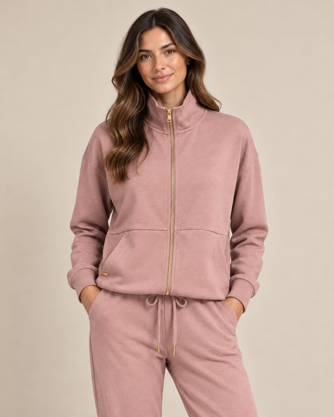 Tuta donna rosa cipria con zip e pantaloni jogger Selmark