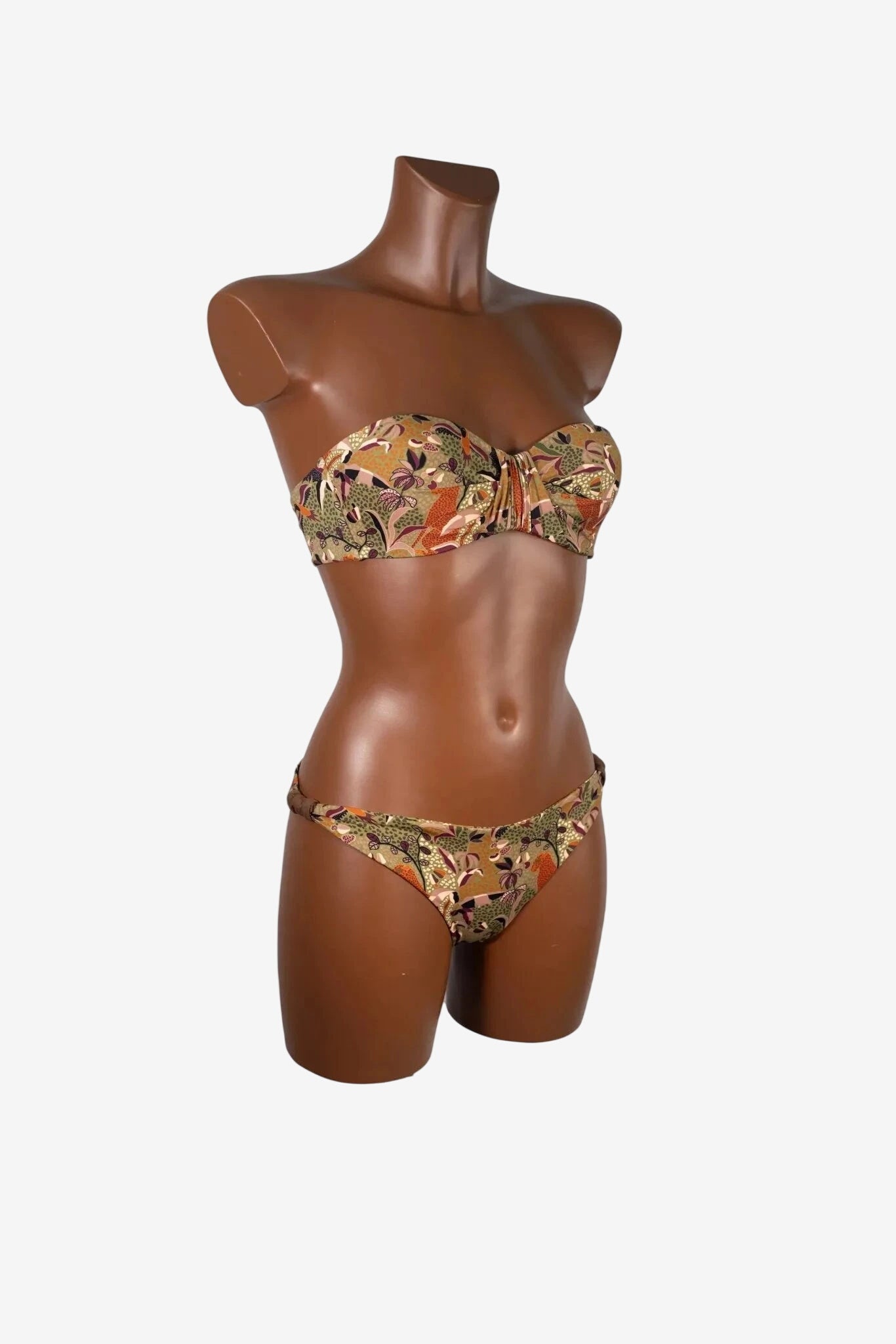 Bikini balconette Vista Mare con stampa floreale nei toni del beige, oro, arancione e verde.