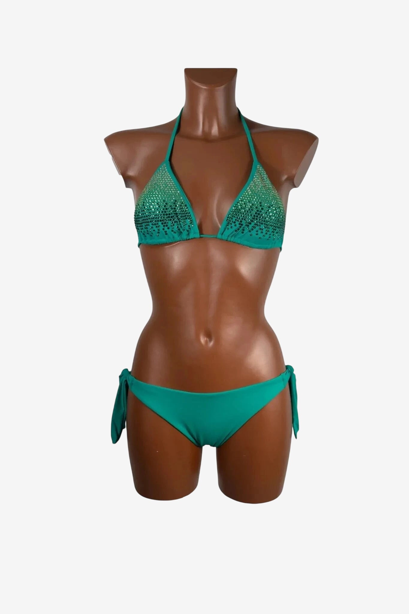 A teal triangle bikini top with green rhinestone embellishments and matching side-tie bottoms.