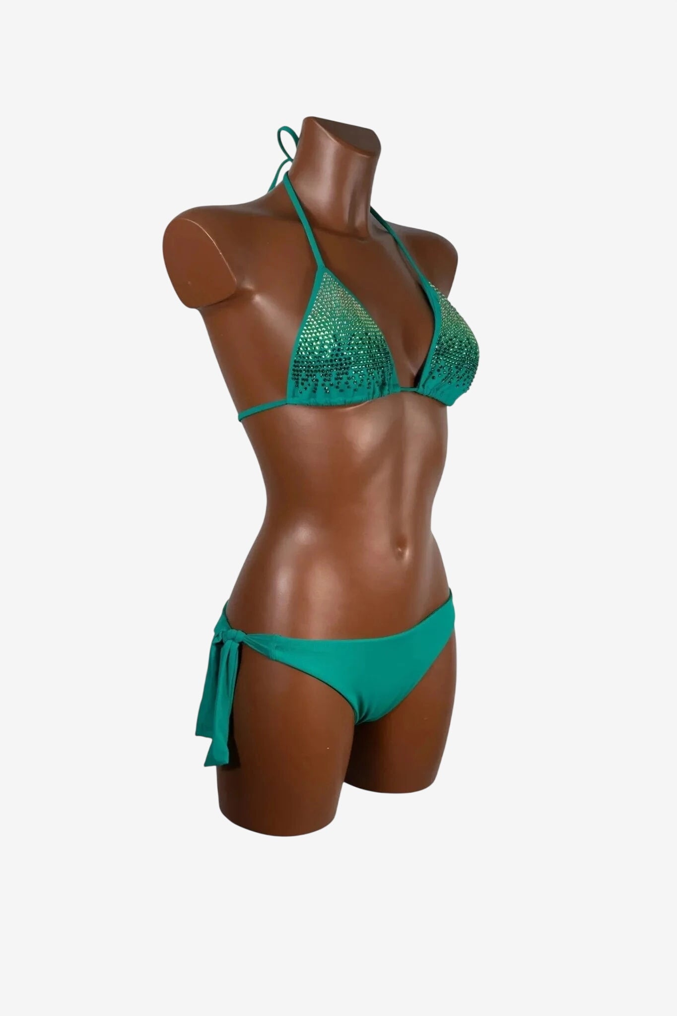 A teal triangle bikini top with rhinestone embellishments paired with matching side-tie bottoms.