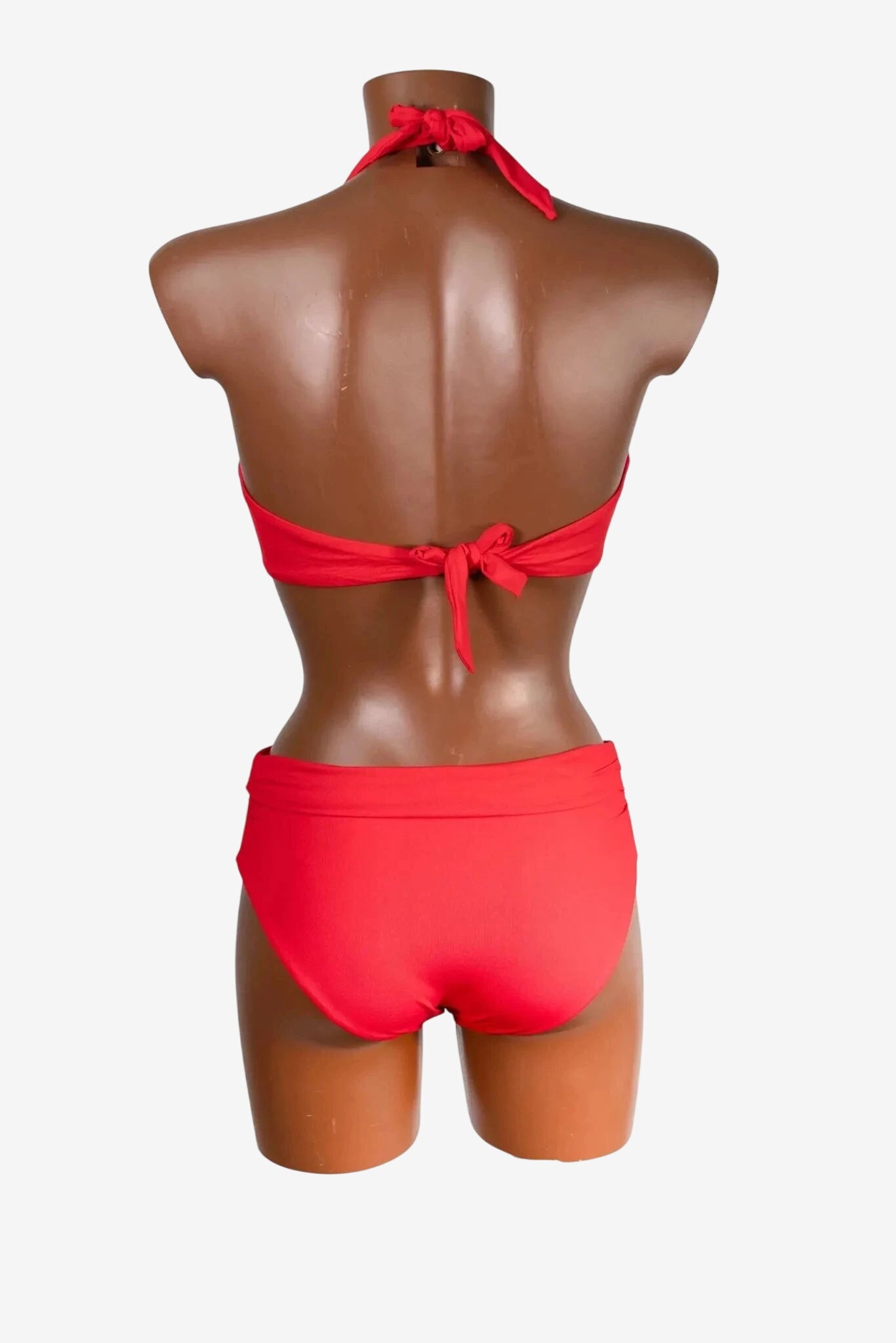 A red Genius triangle bikini with a halter neck and back tie closure shown from the back.
