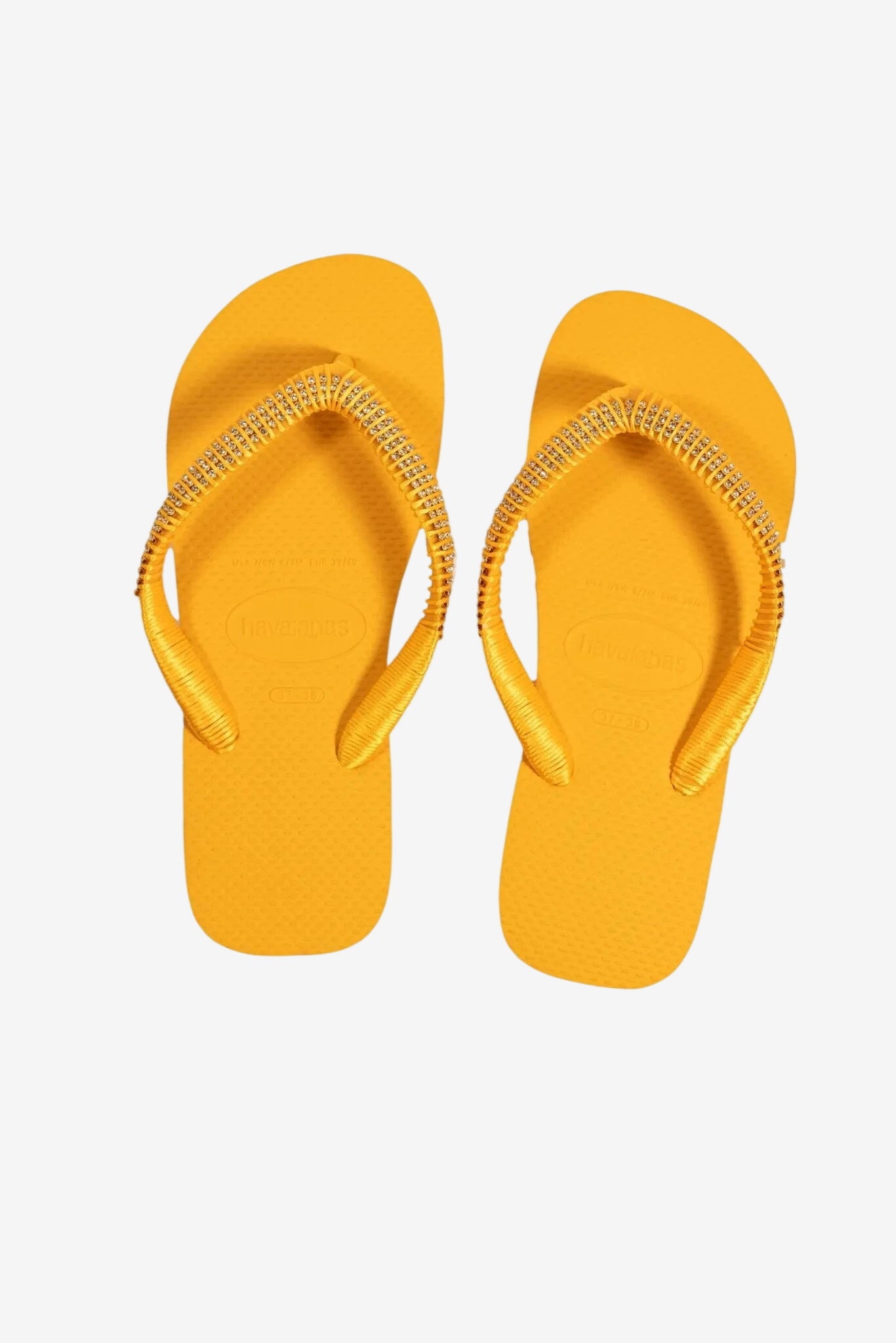 Infradito da donna color giallo sole con cinturini decorati da piccoli strass.