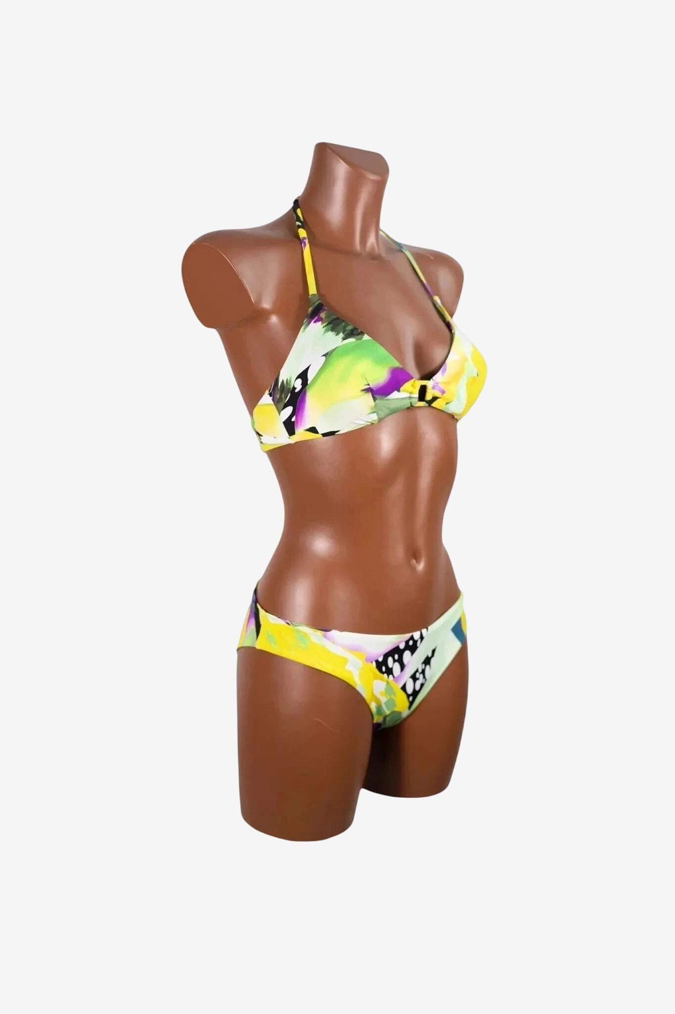 Bikini bralette Marette con fantasia lime su manichino.