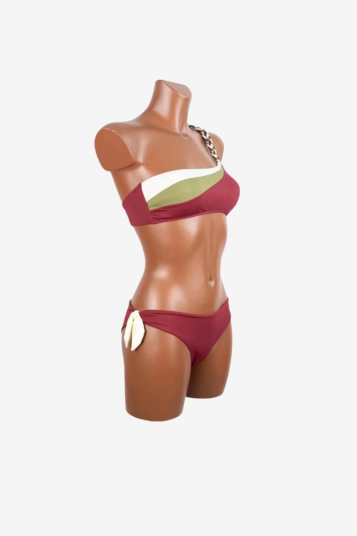 Bikini monospalla da donna Marette tricolore con top asimmetrico e slip con laccetti laterali.