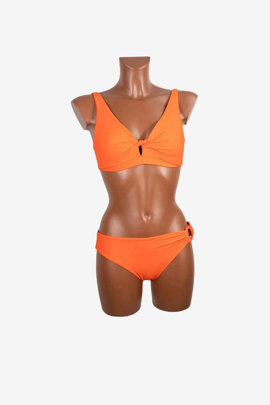 A bright orange bikini set with a knotted V-neck top and matching bottoms on a mannequin.