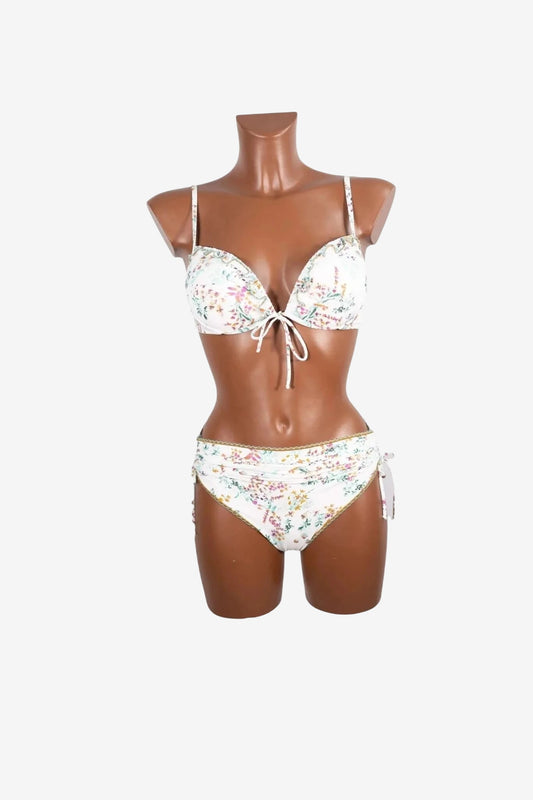 Bikini push up da donna bianco con fantasia floreale e coppe imbottite con ferretto.