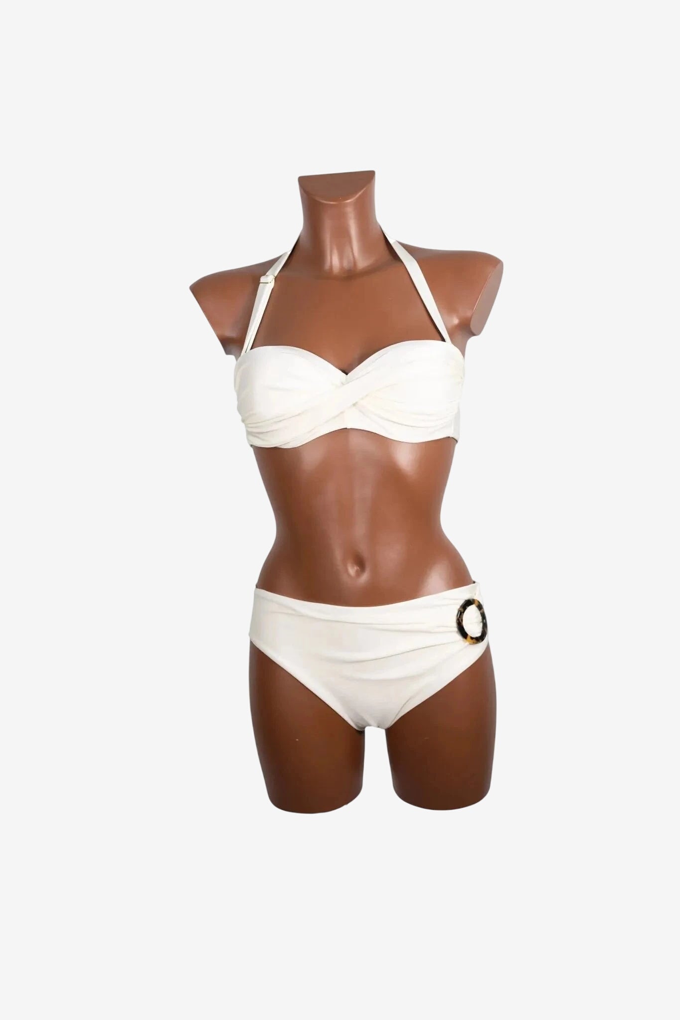 A white balconette bikini set featuring a halter neck top and bottoms with a side ring detail.