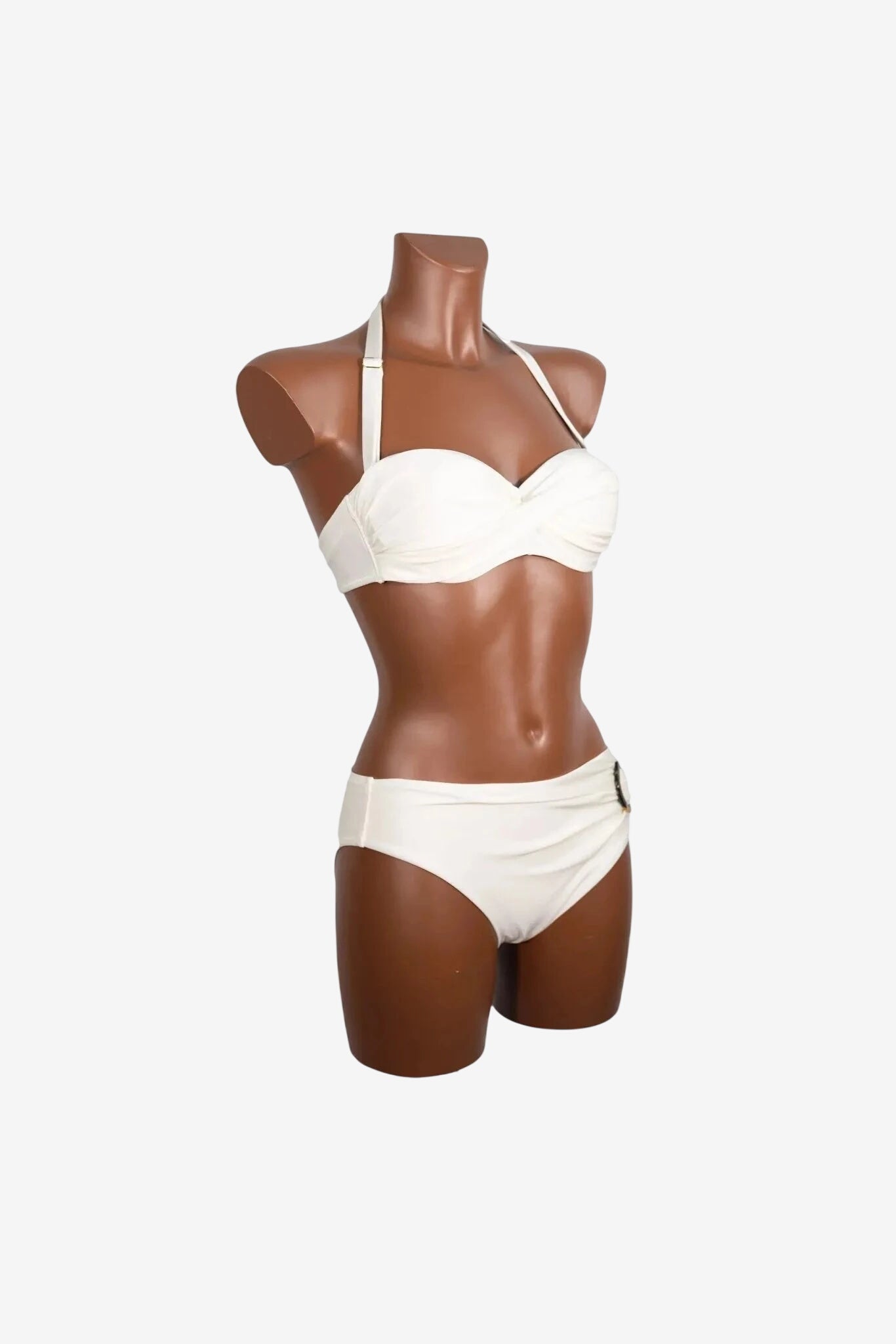 A white balconette bikini set displayed on a brown mannequin.