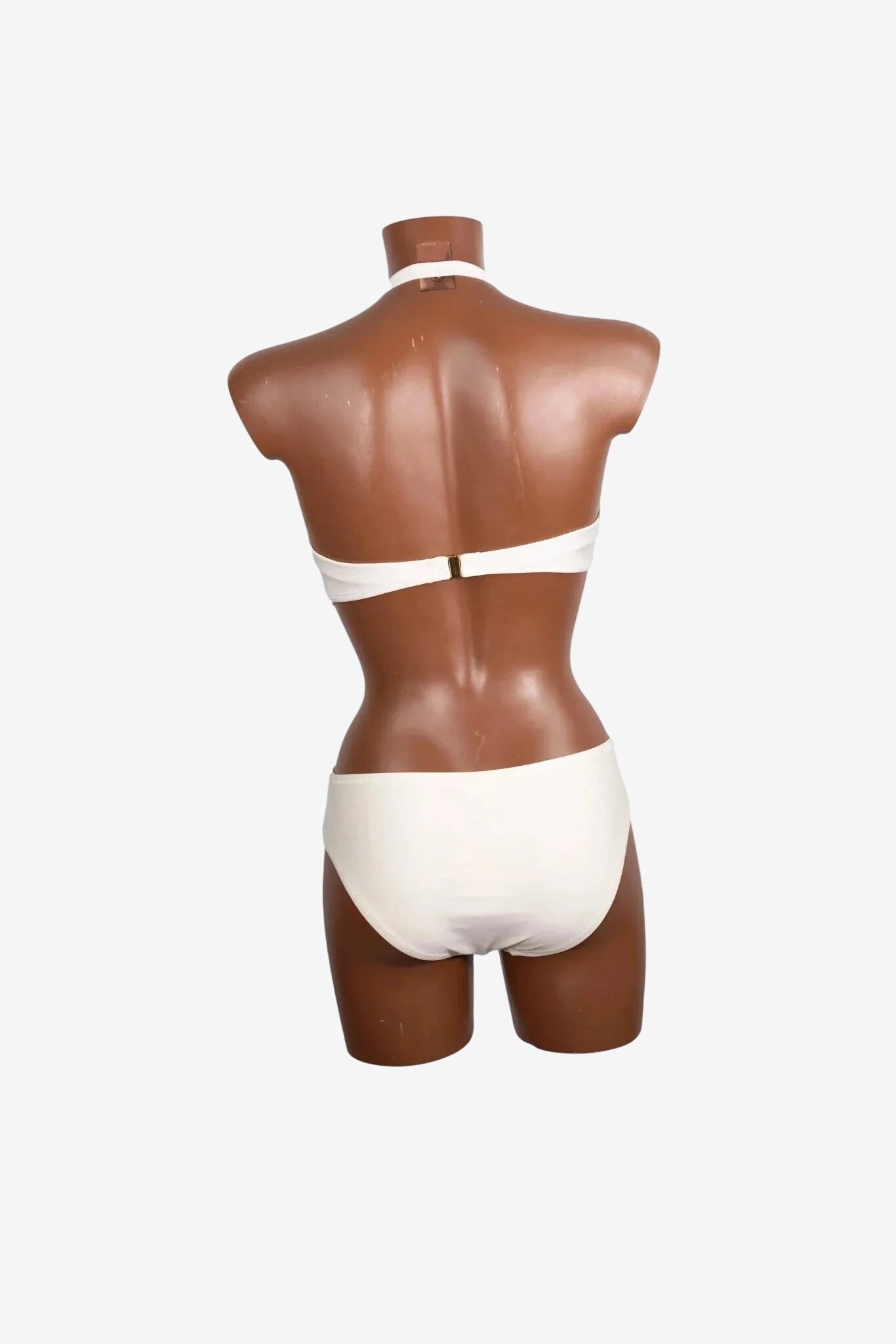 A white balconette bikini set shown from the back on a mannequin.