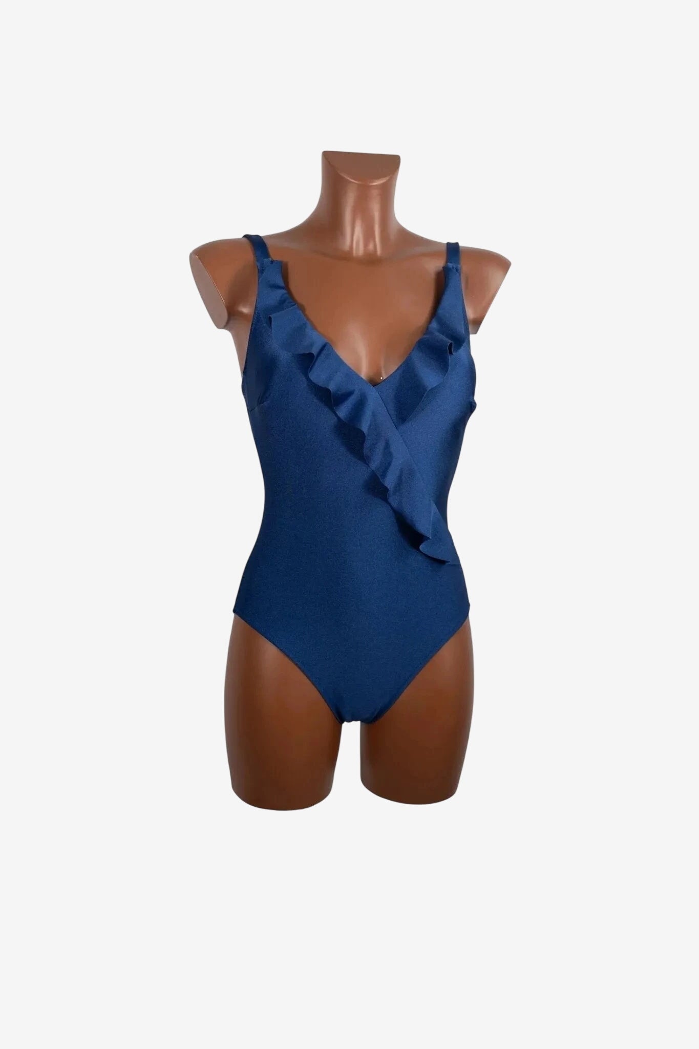 Costume intero blu scuro con scollo a V decorato da una balza elegante.