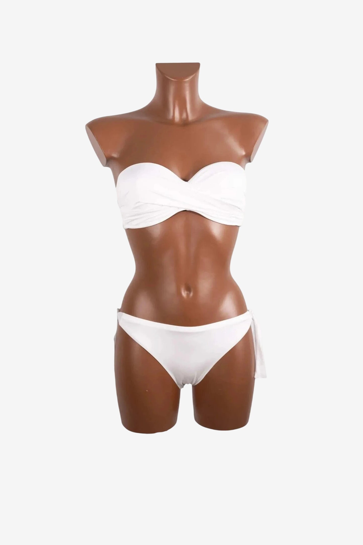 A white strapless balconette bikini set displayed on a brown mannequin.