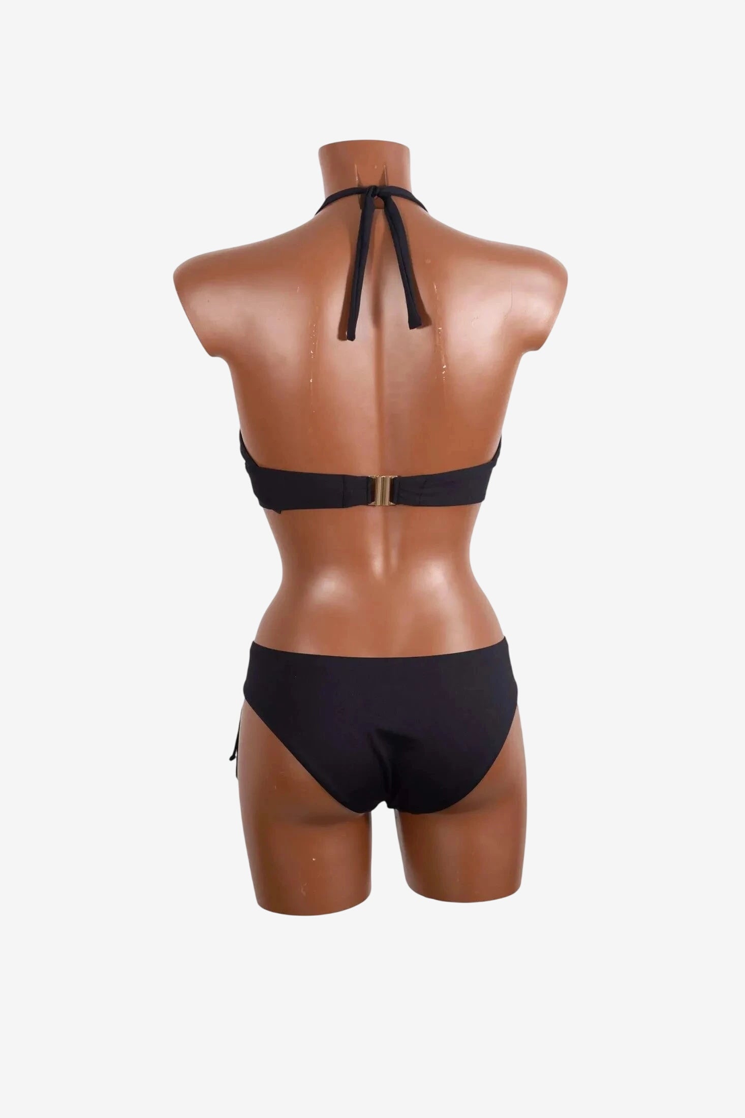 Vista posteriore di un bikini a triangolo nero Roidal con allacciatura al collo e slip con fiocchi.