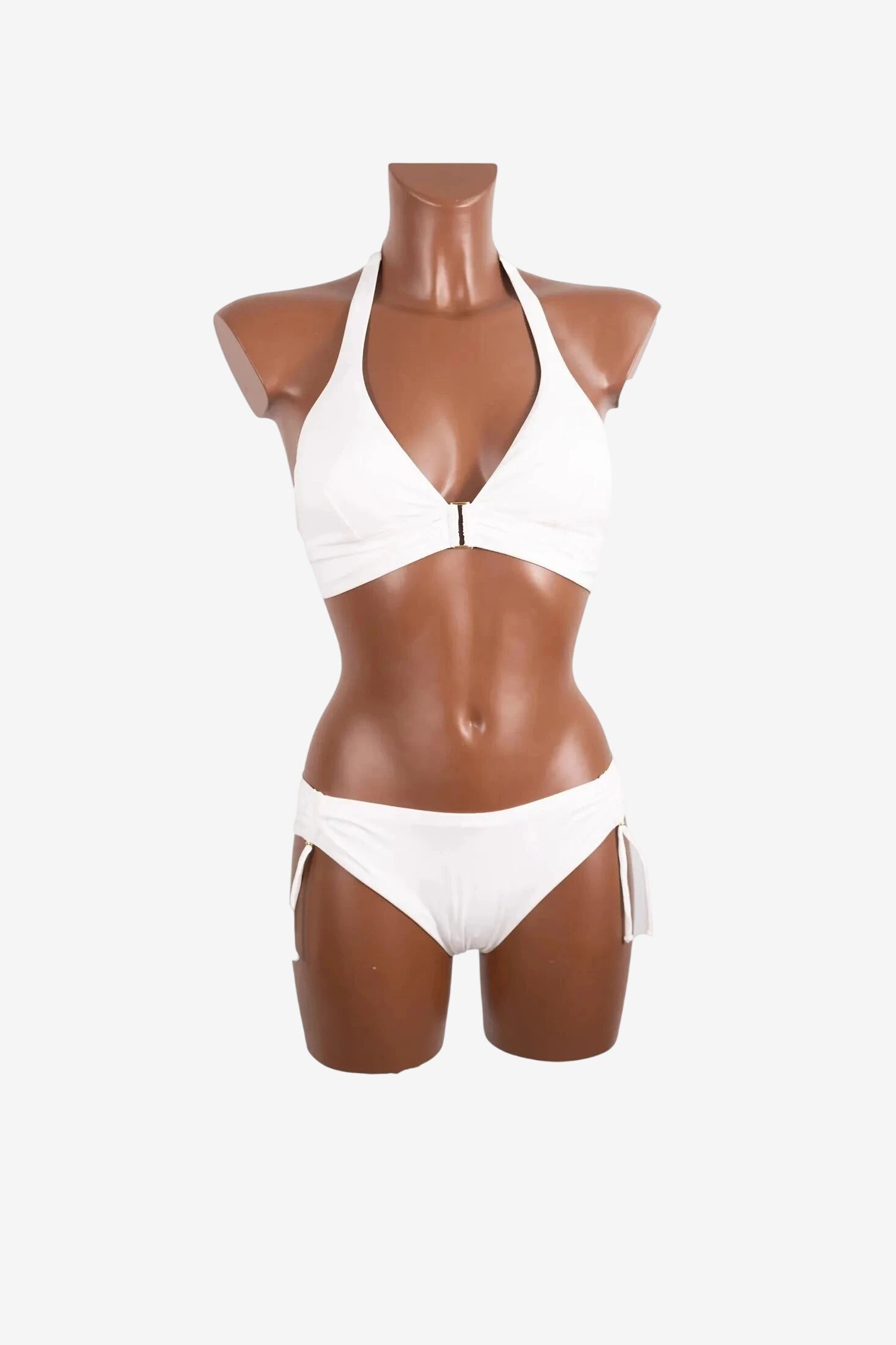 Bikini a triangolo bianco Roidal con allacciatura al collo e slip con fiocchi laterali.
