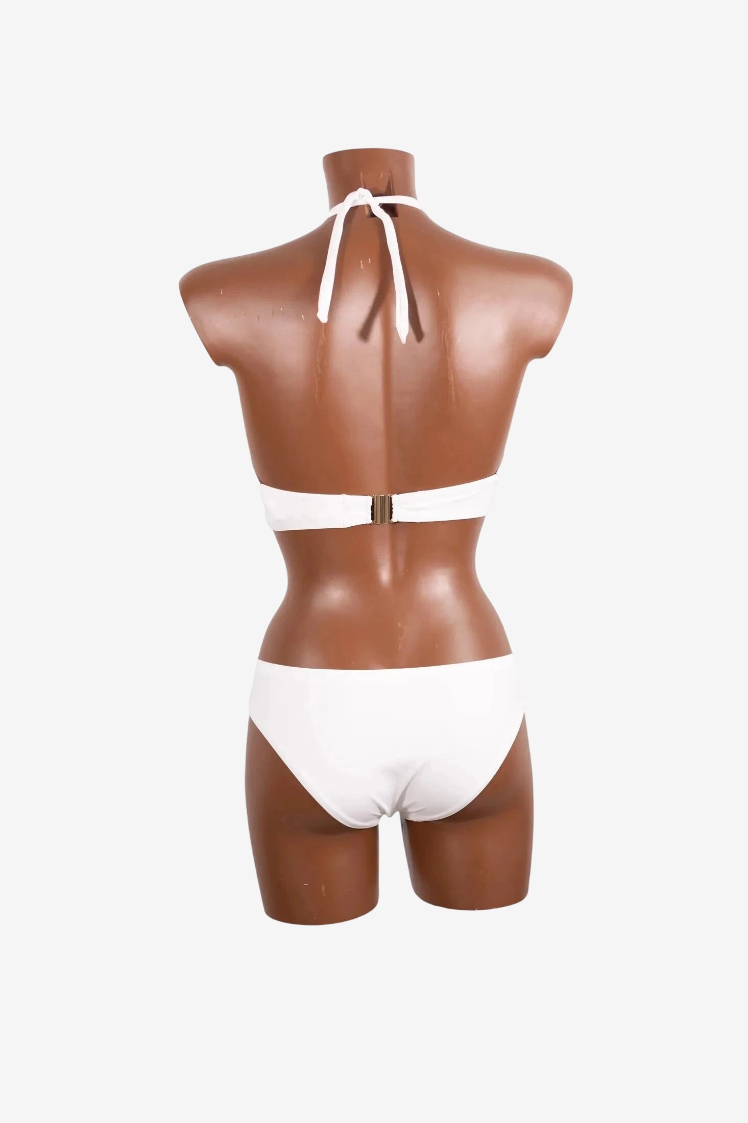 Bikini a triangolo bianco Roidal con allacciatura al collo e slip con fiocchi laterali.