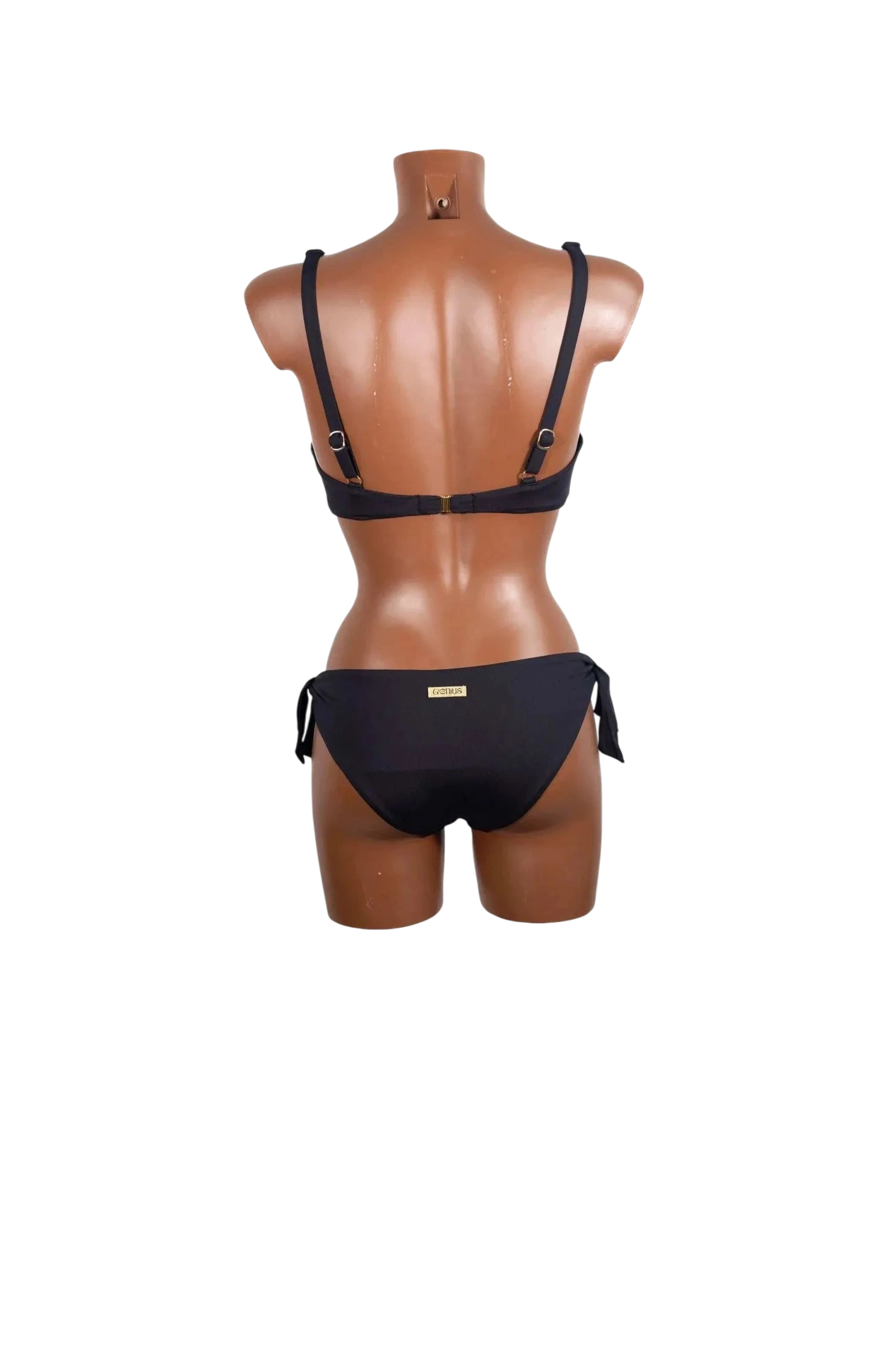 Bikini nero con ferretto e spalline regolabili indossato da un manichino visto da dietro.