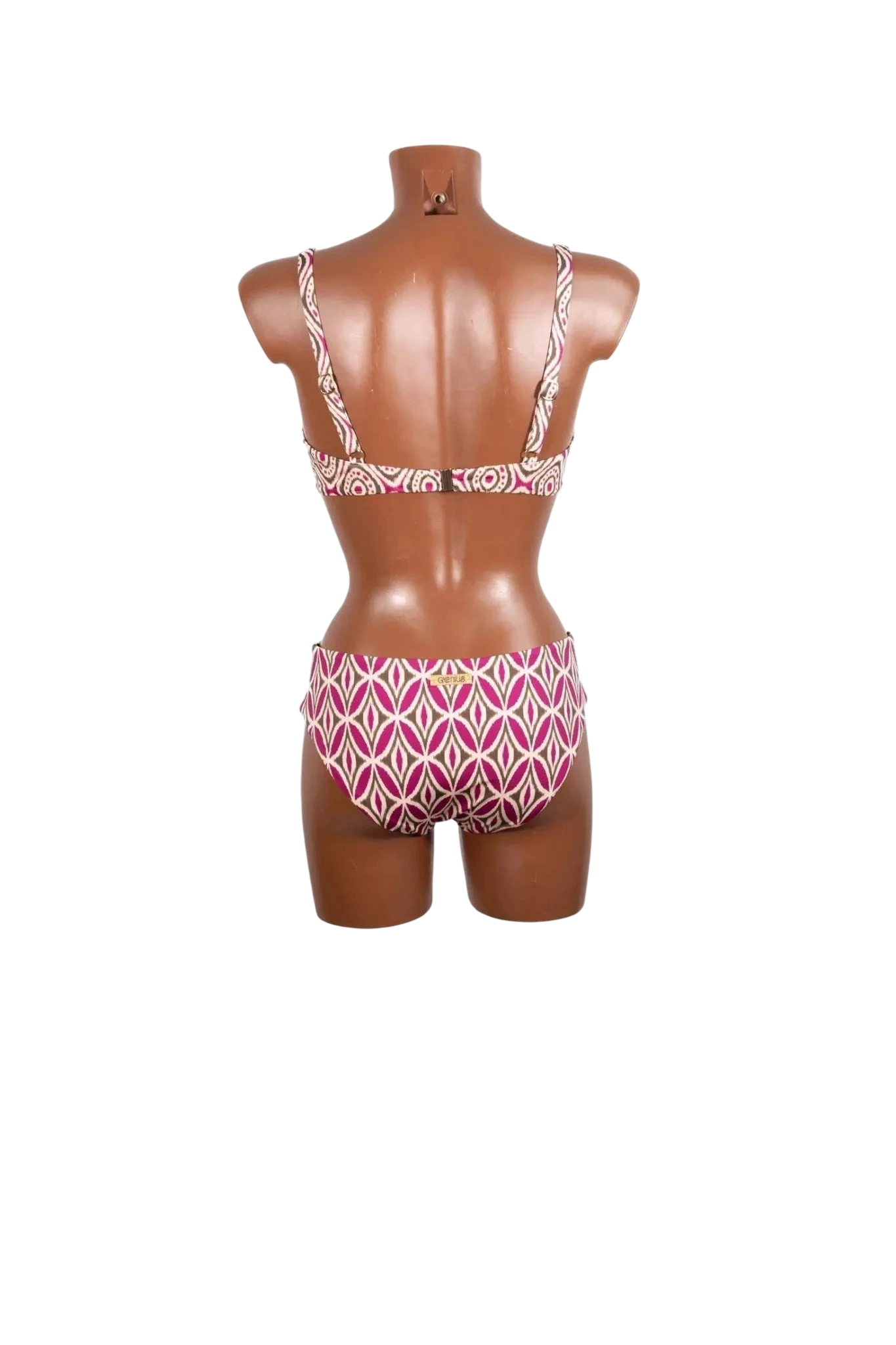 A back view of a bikini set featuring a pink and white geometric pattern on a mannequin.