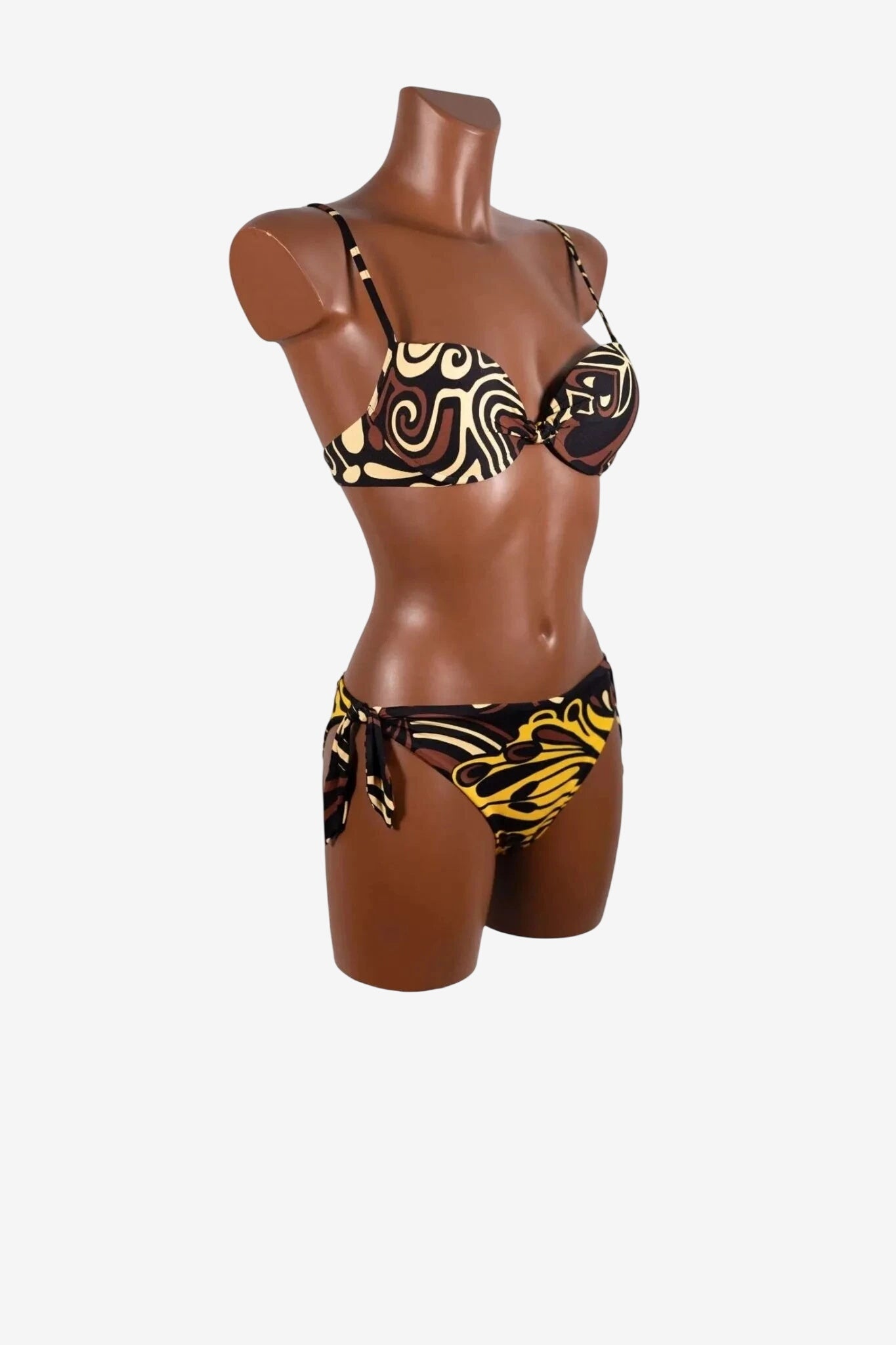 Bikini push-up Miss Bikini con fantasia tribale Africa marrone su manichino.