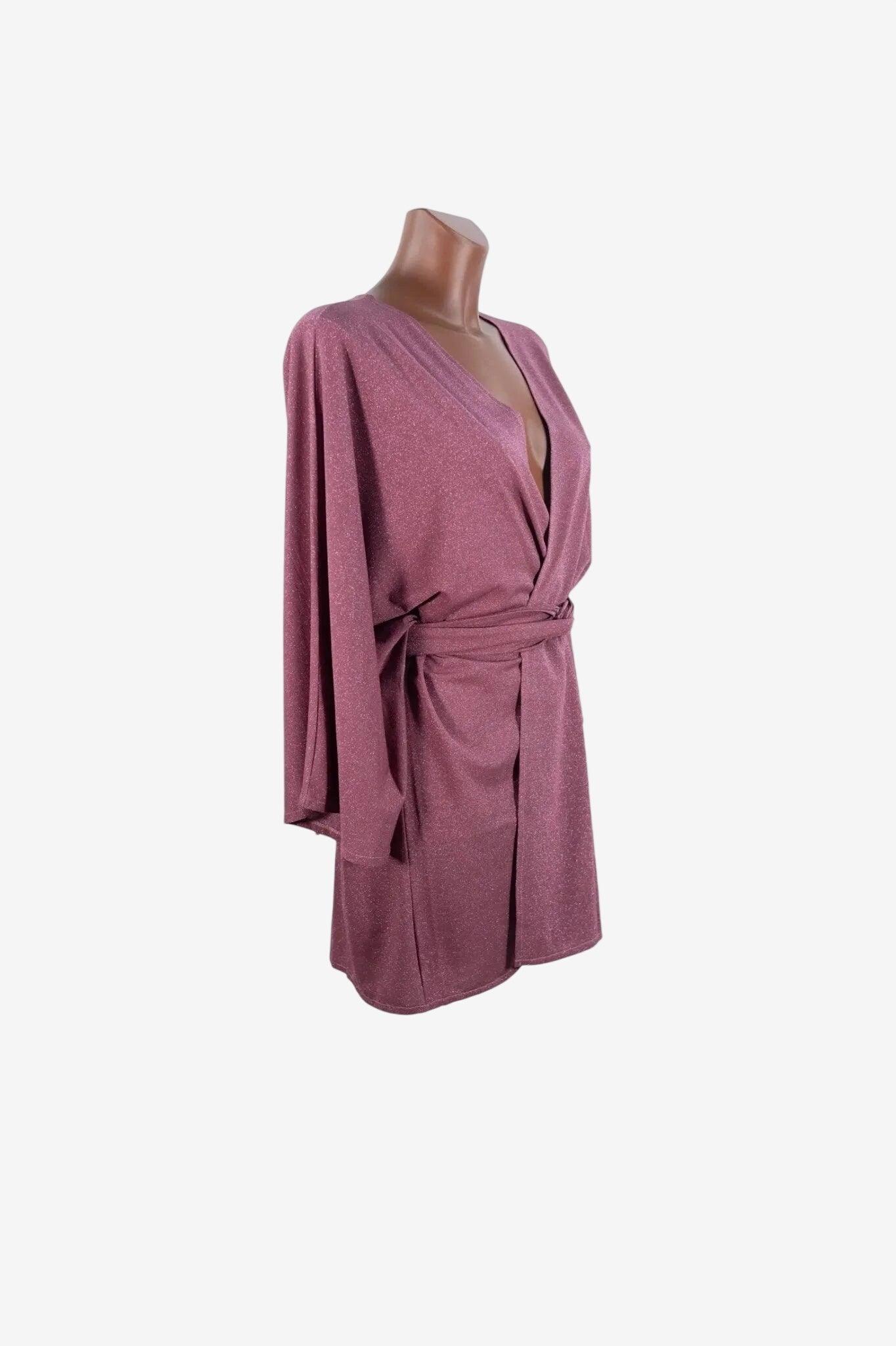 A mauve-colored, shimmering kimono-style wrap dress with wide sleeves and a tie waist.