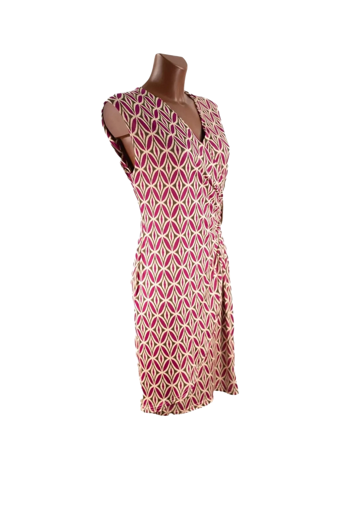 Abito corto a portafoglio con fantasia geometrica bicolore su manichino.