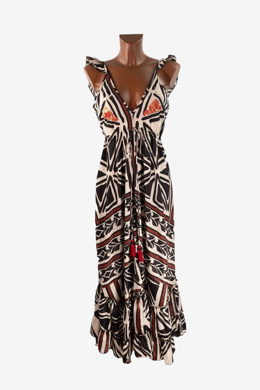 Abito lungo Iconique senza maniche con stampa geometrica, scollo a V e dettagli con nappine.