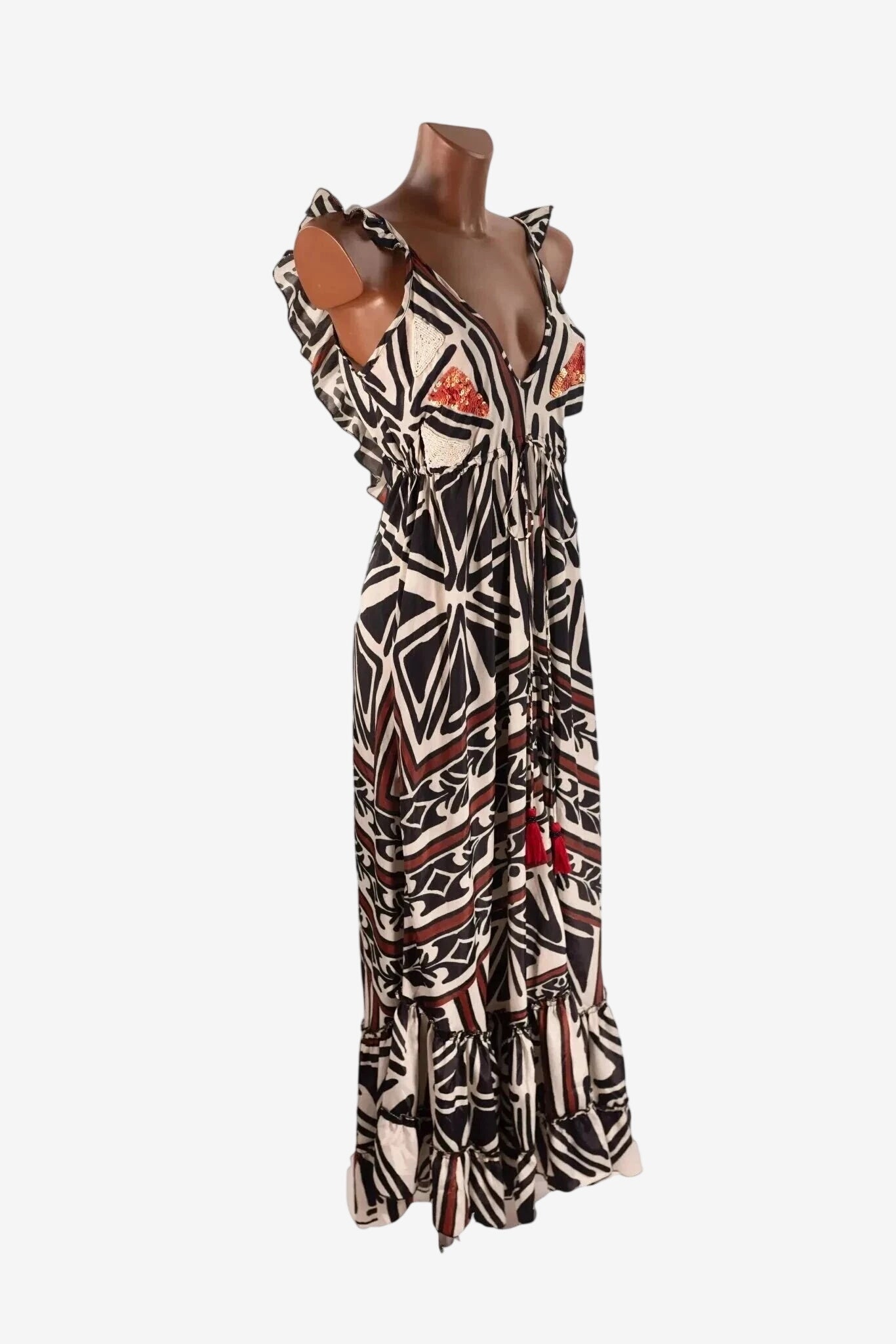 Abito lungo Iconique senza maniche con stampa geometrica, scollo a V e dettagli con nappine.