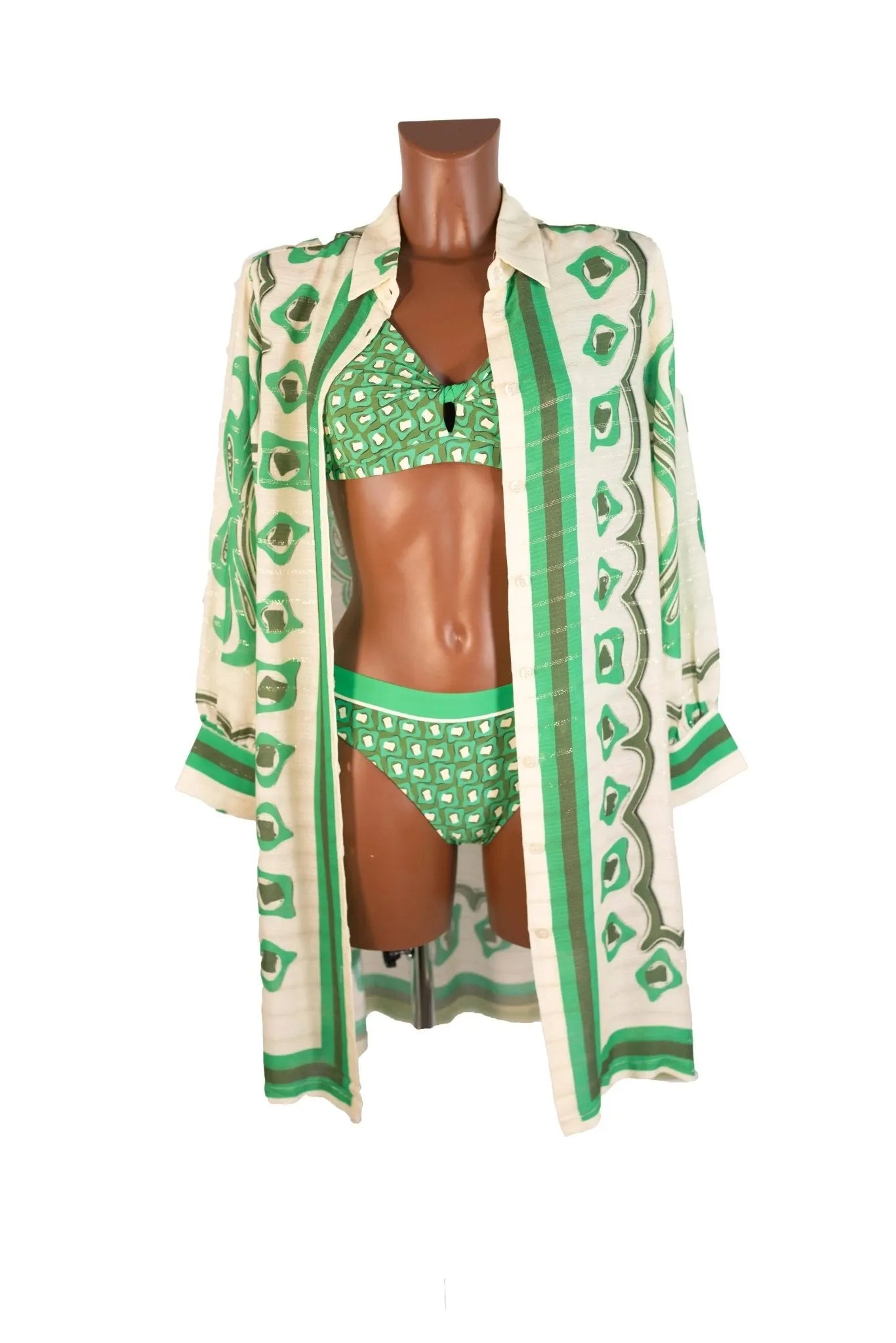 A long-sleeved green and white patterned viscose shirt worn over a matching bikini set.
