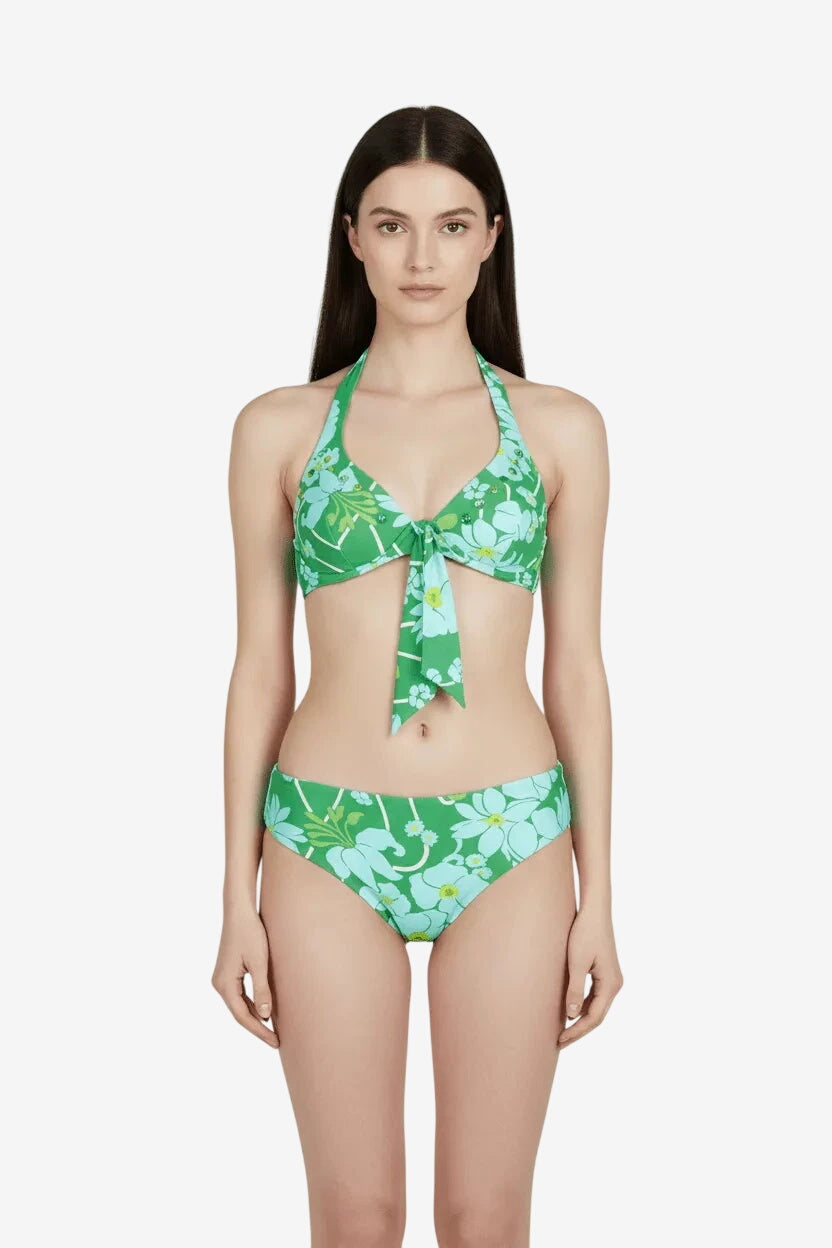 Bikini Raffaela D'Angelo con ferretto e fantasia floreale verde su fondo chiaro.