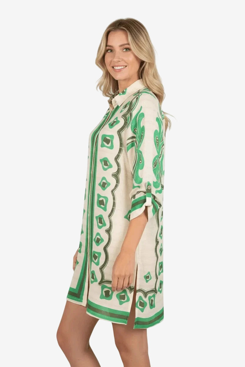 Camicione in viscosa color crema con fantasia geometrica e floreale verde.