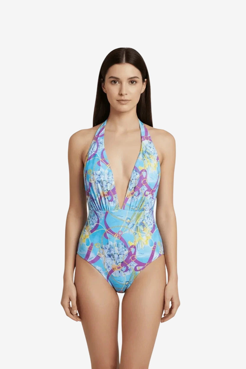 Costume intero azzurro con scollo profondo, stampa a catene e vestibilità sgambata.