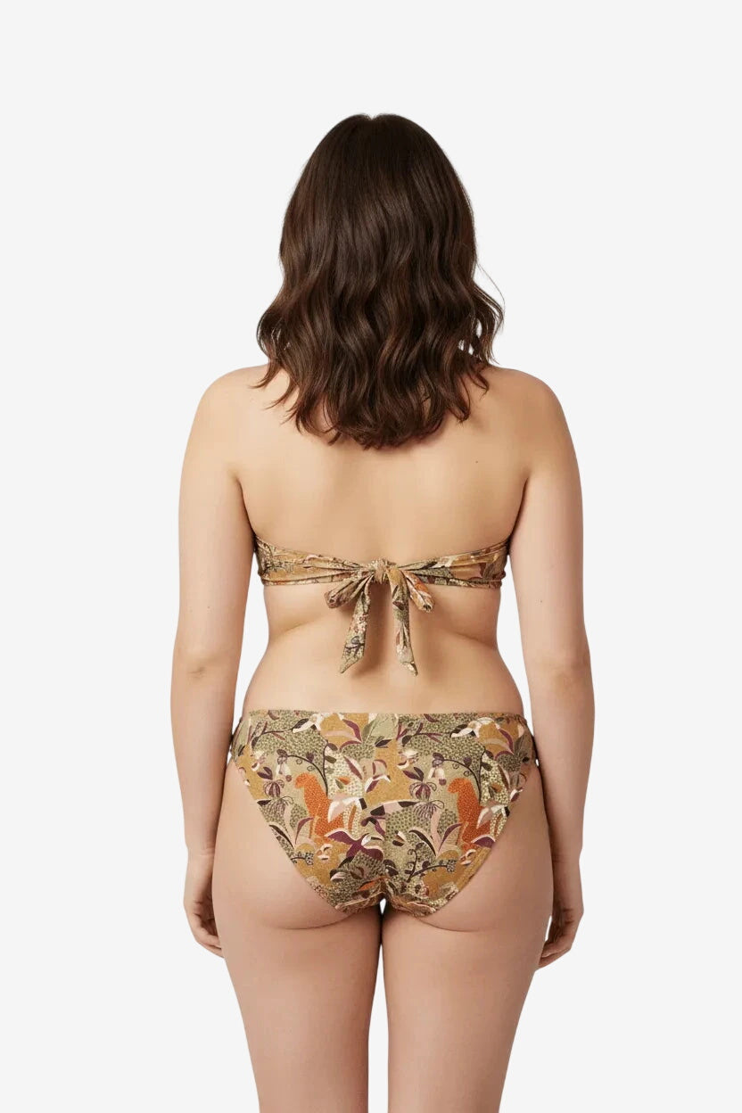 Vista posteriore di un bikini balconette con stampa floreale nei toni del beige e oro.