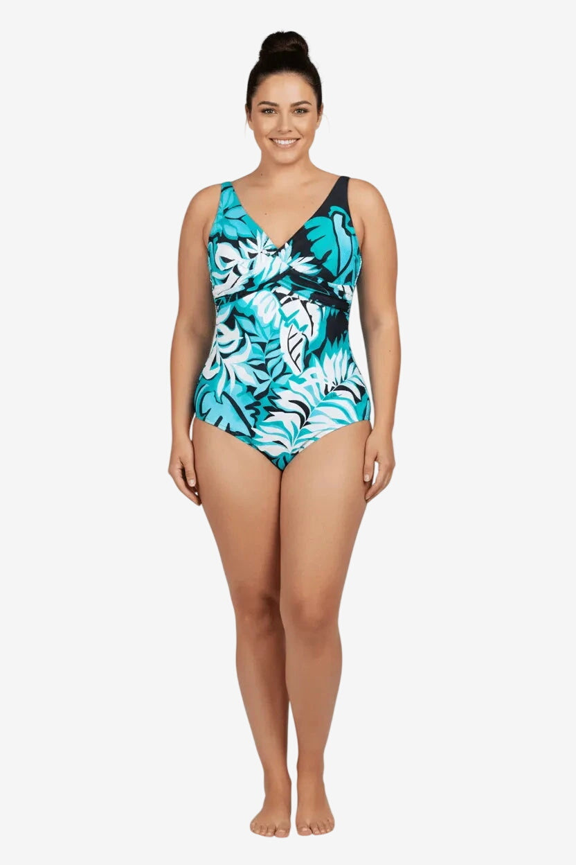 Costume intero Roidal con scollo a V e fantasia tropicale nei toni del turchese e nero.