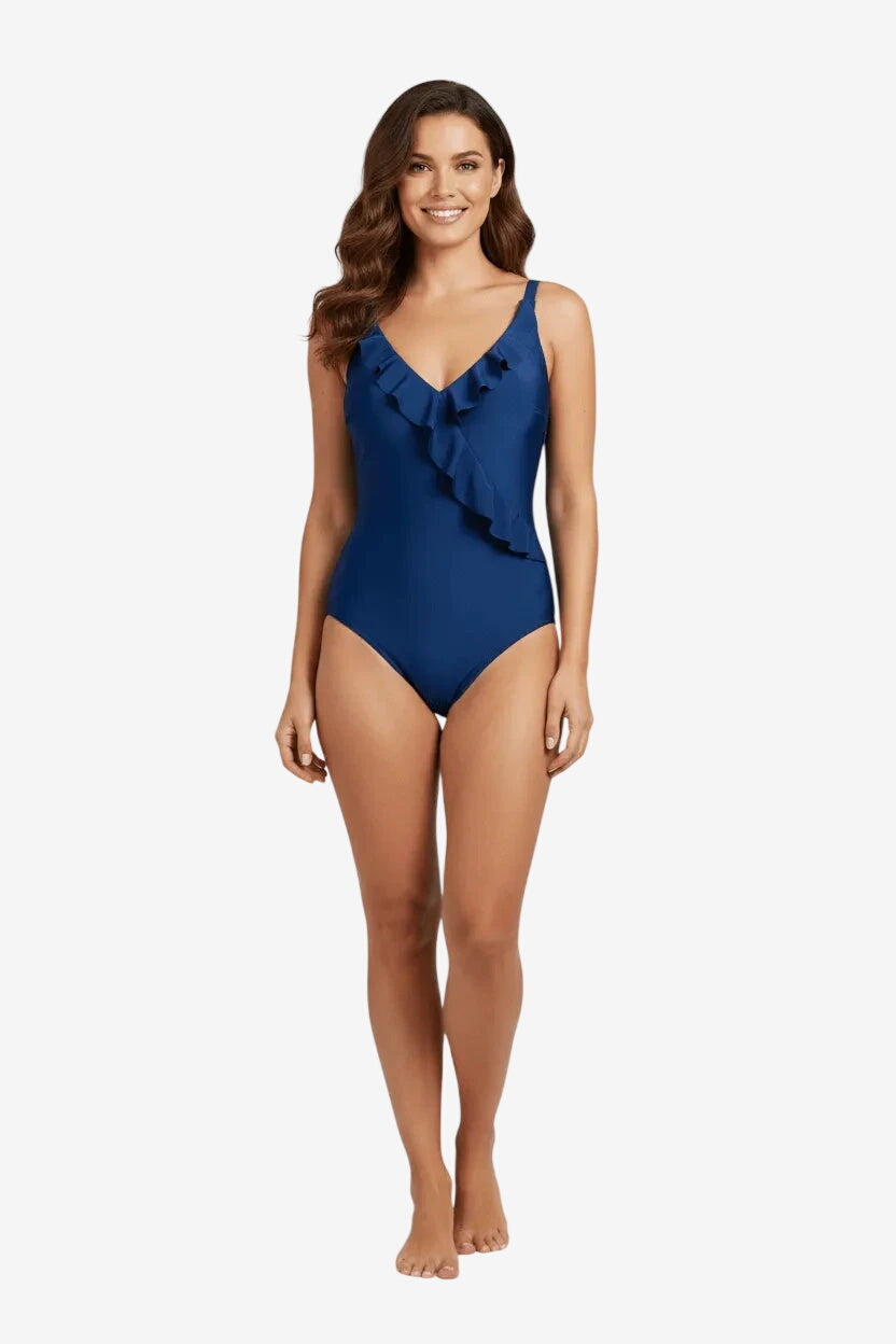 Costume intero blu con scollo a V e dettaglio a balza frontale.
